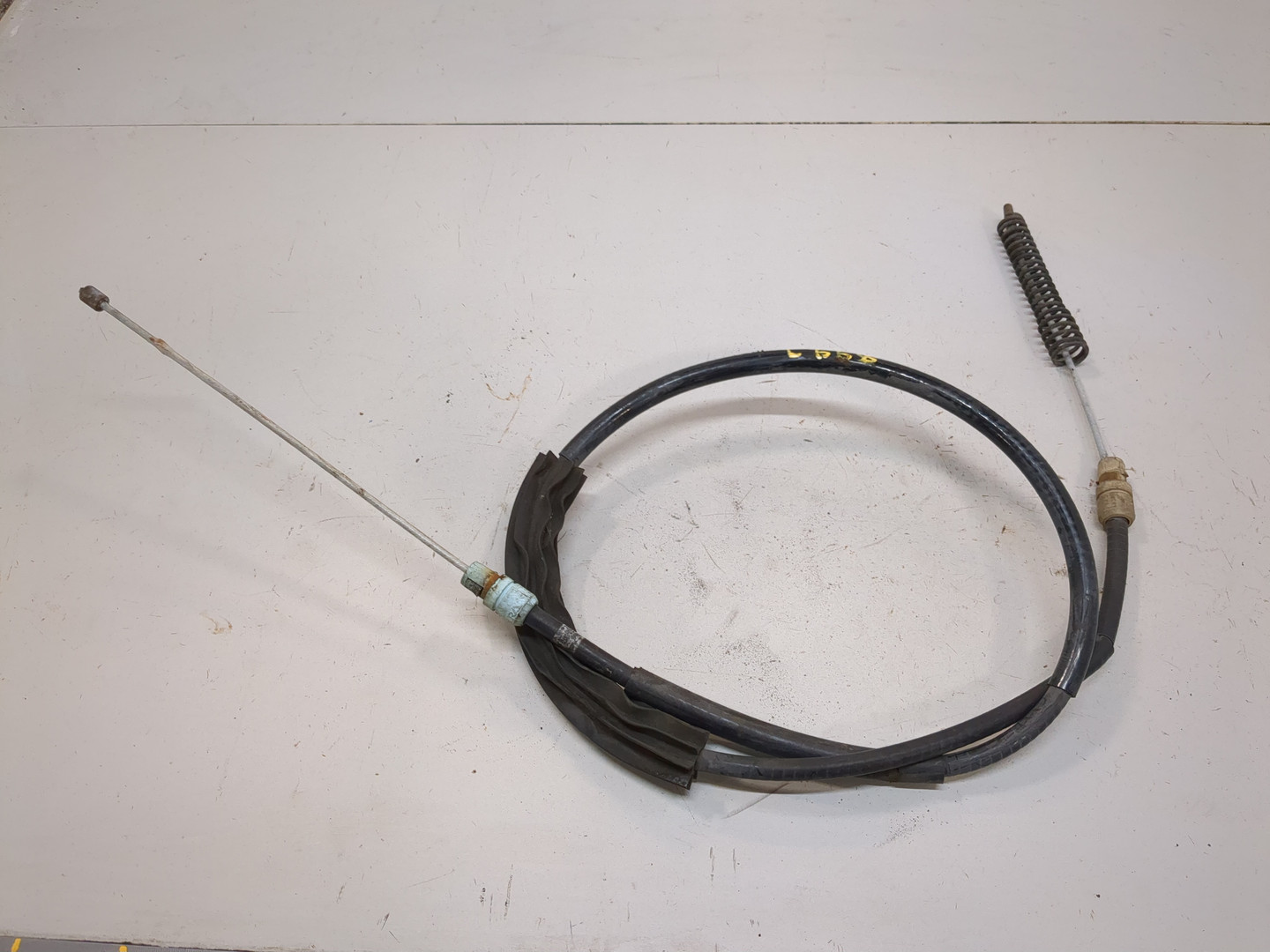 Трос стояночного тормоза