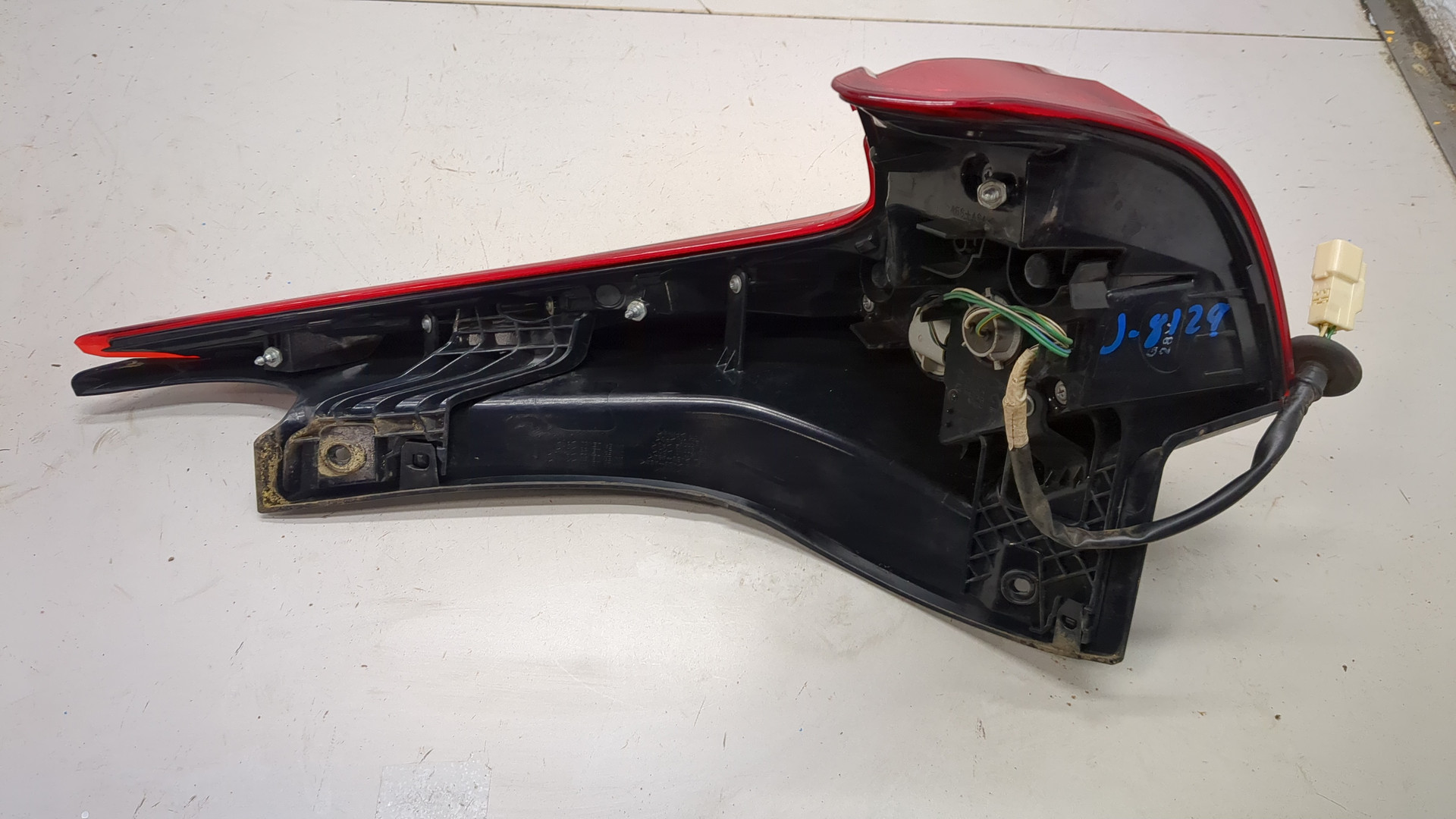 Фонарь задний левый