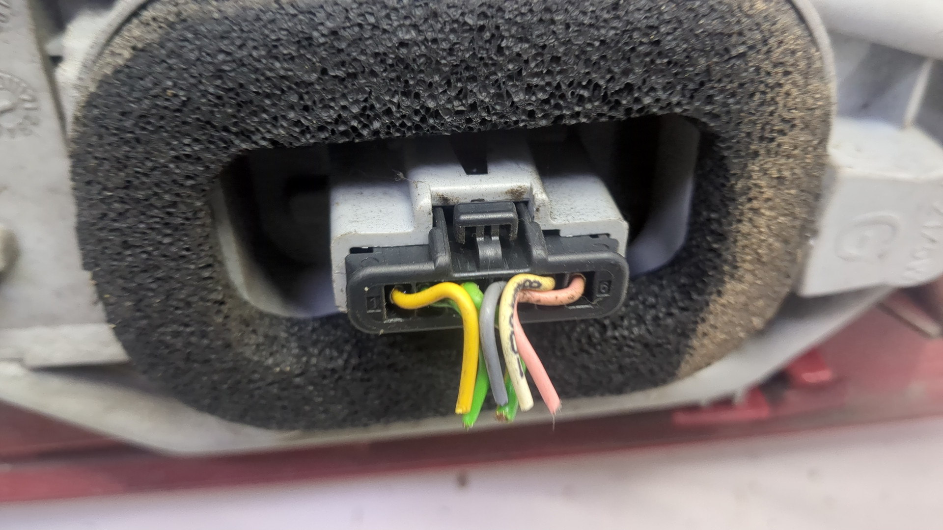 Фонарь задний левый