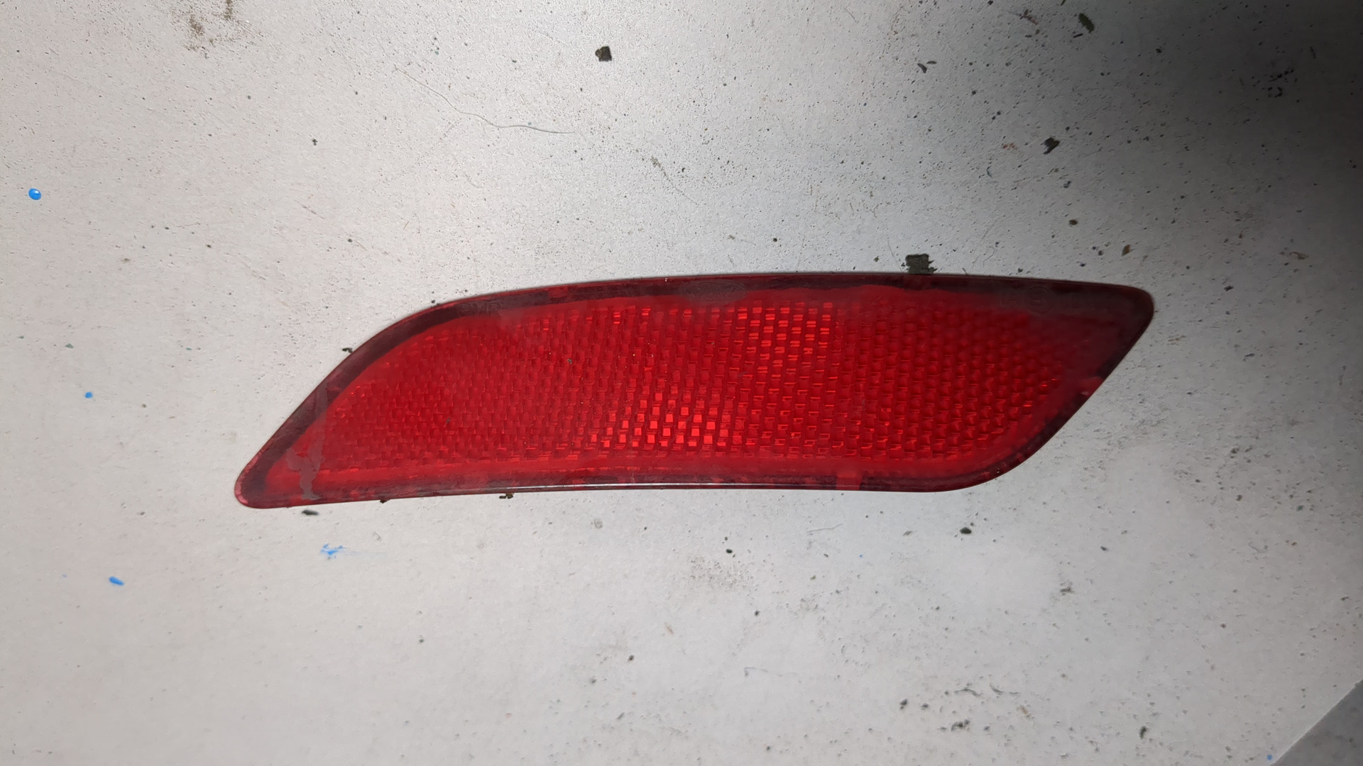 Отражатель в бампер задний левый