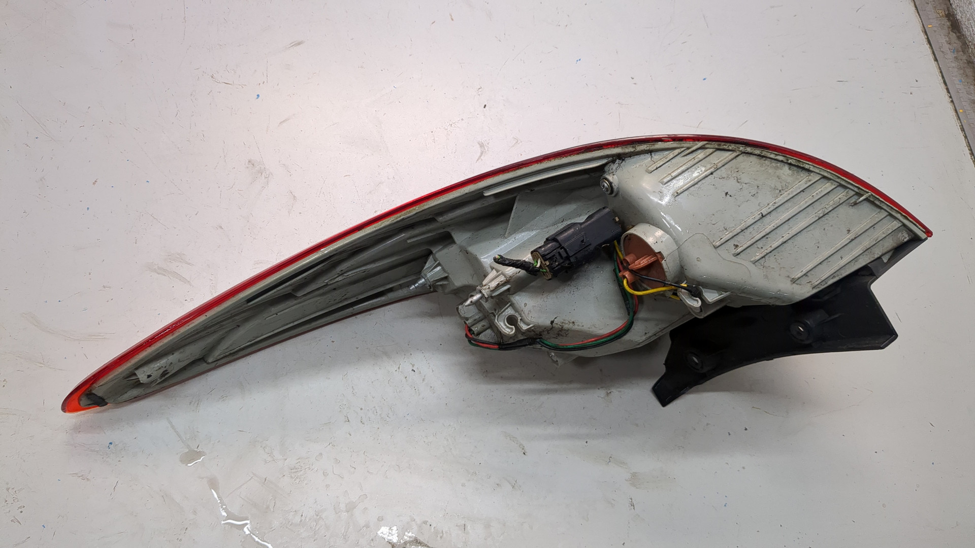 Фонарь задний левый