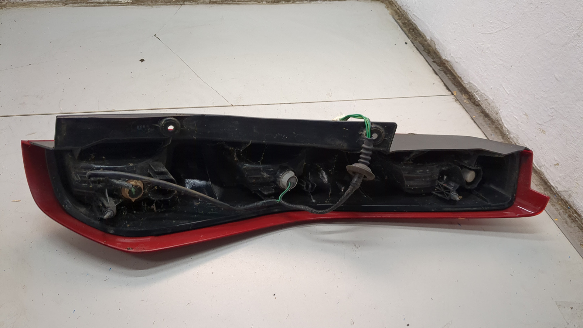 Фонарь задний левый