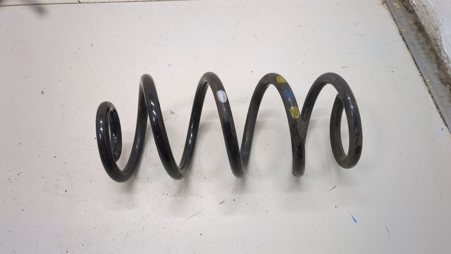 Пружина задняя