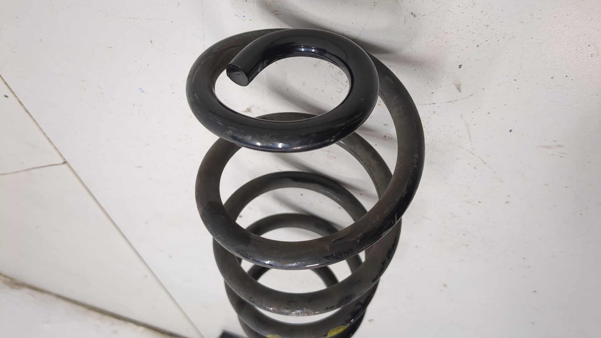 Пружина задняя