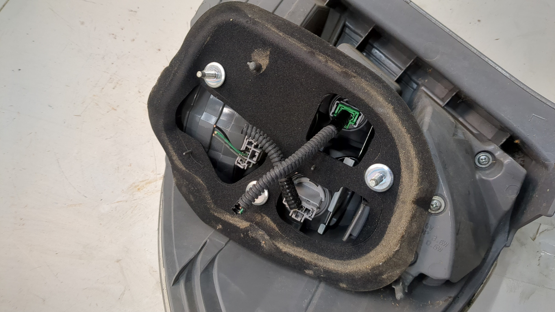 Фонарь задний левый