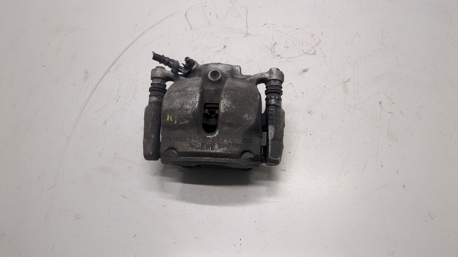 Суппорт передний левый