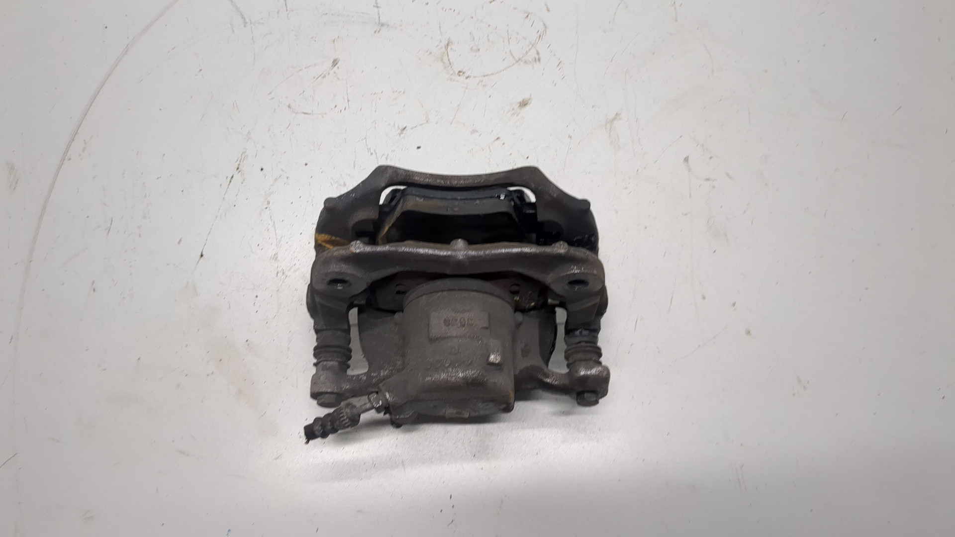 Суппорт передний левый