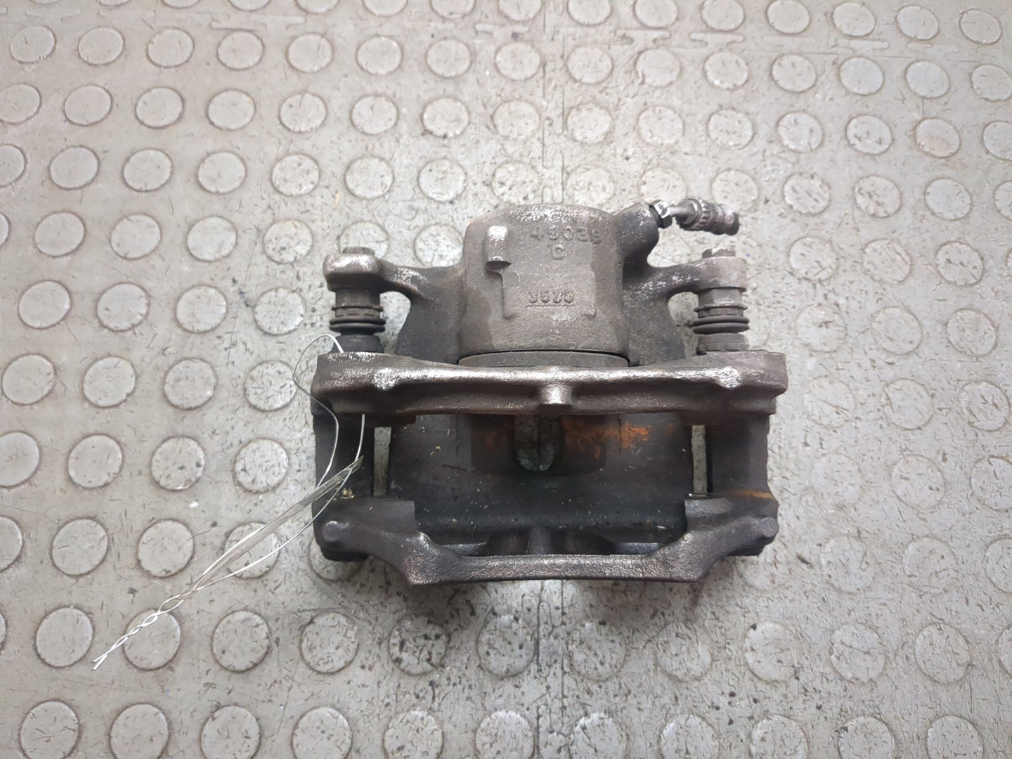 Суппорт передний левый