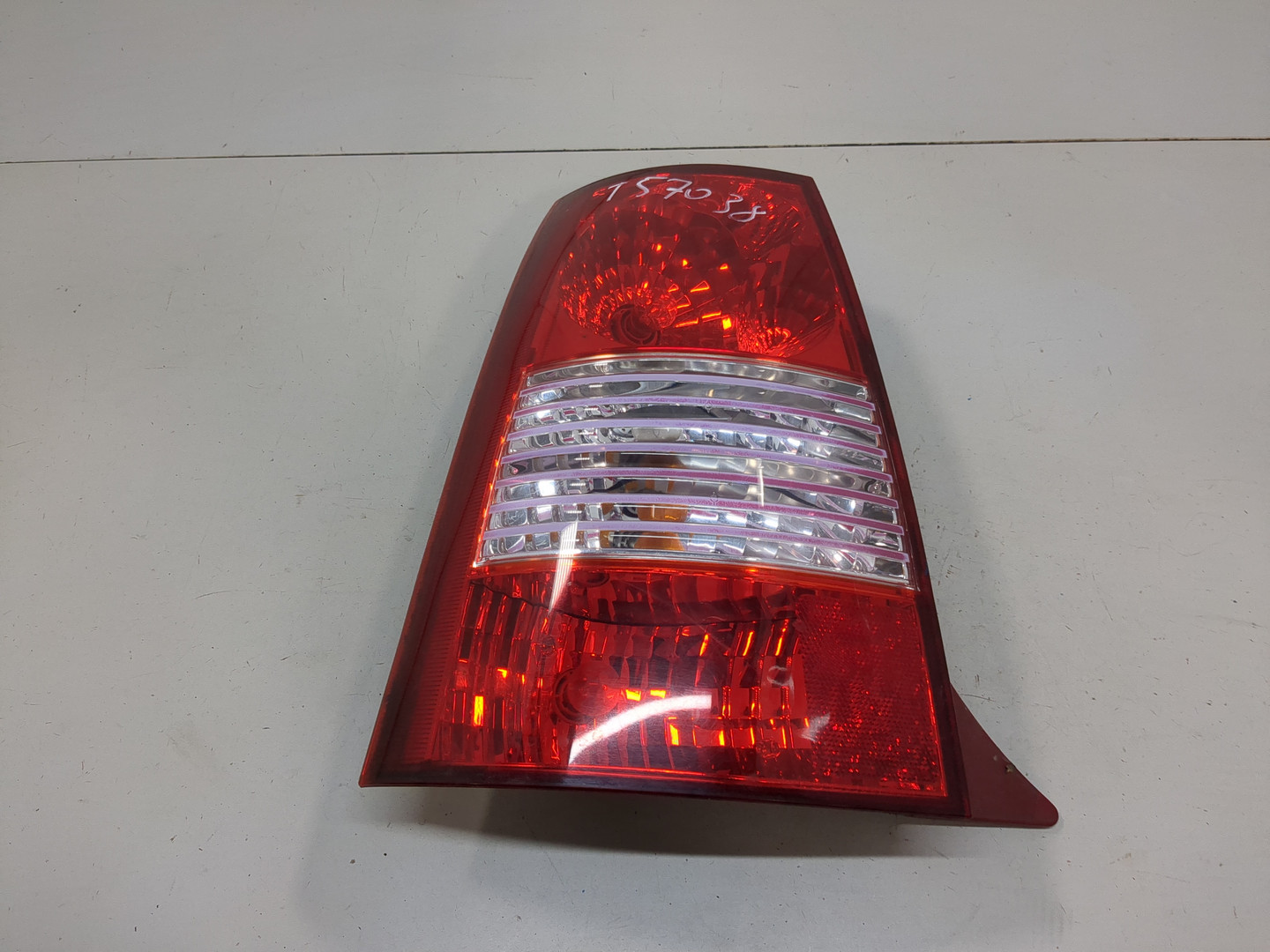 Фонарь задний левый