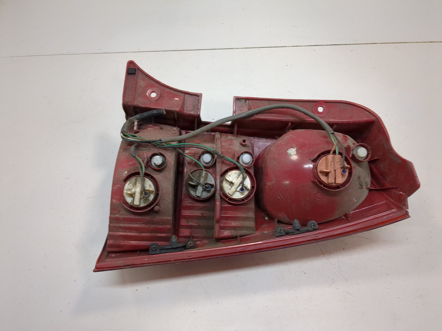 Фонарь задний левый