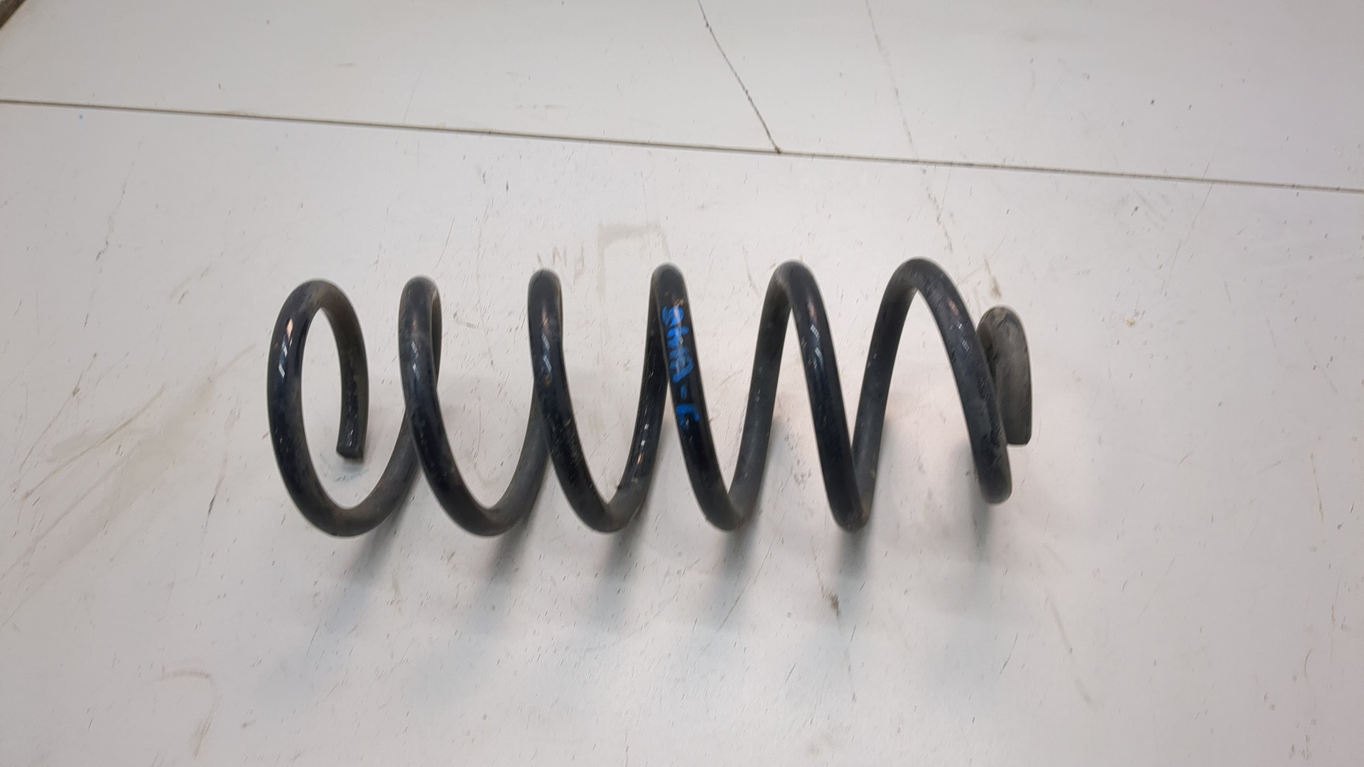 Пружина задняя