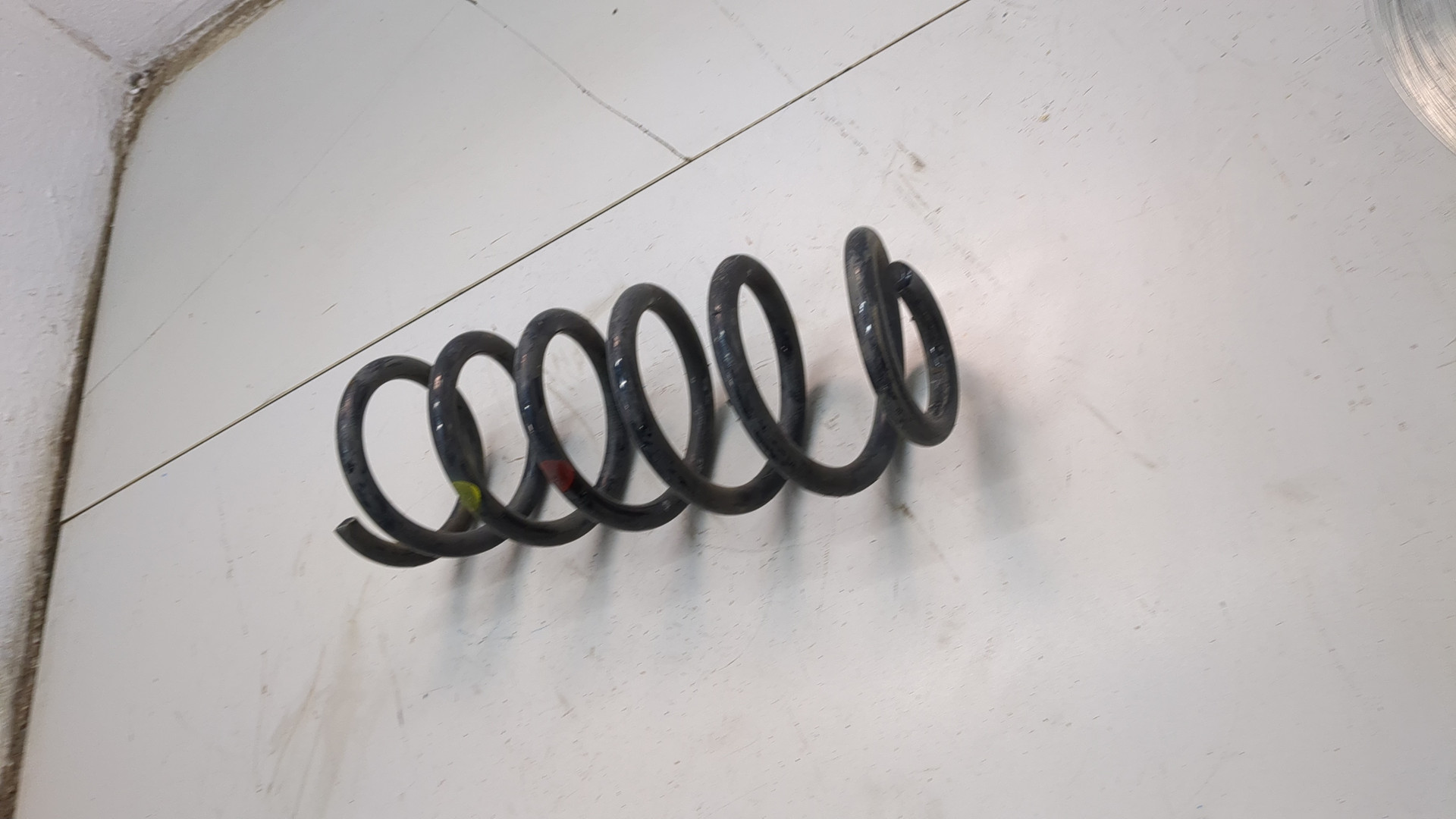 Пружина задняя