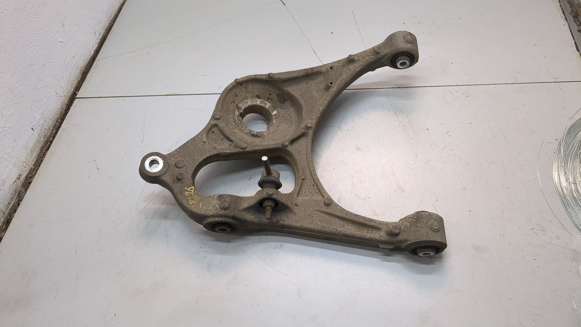 Рычаг задний левый