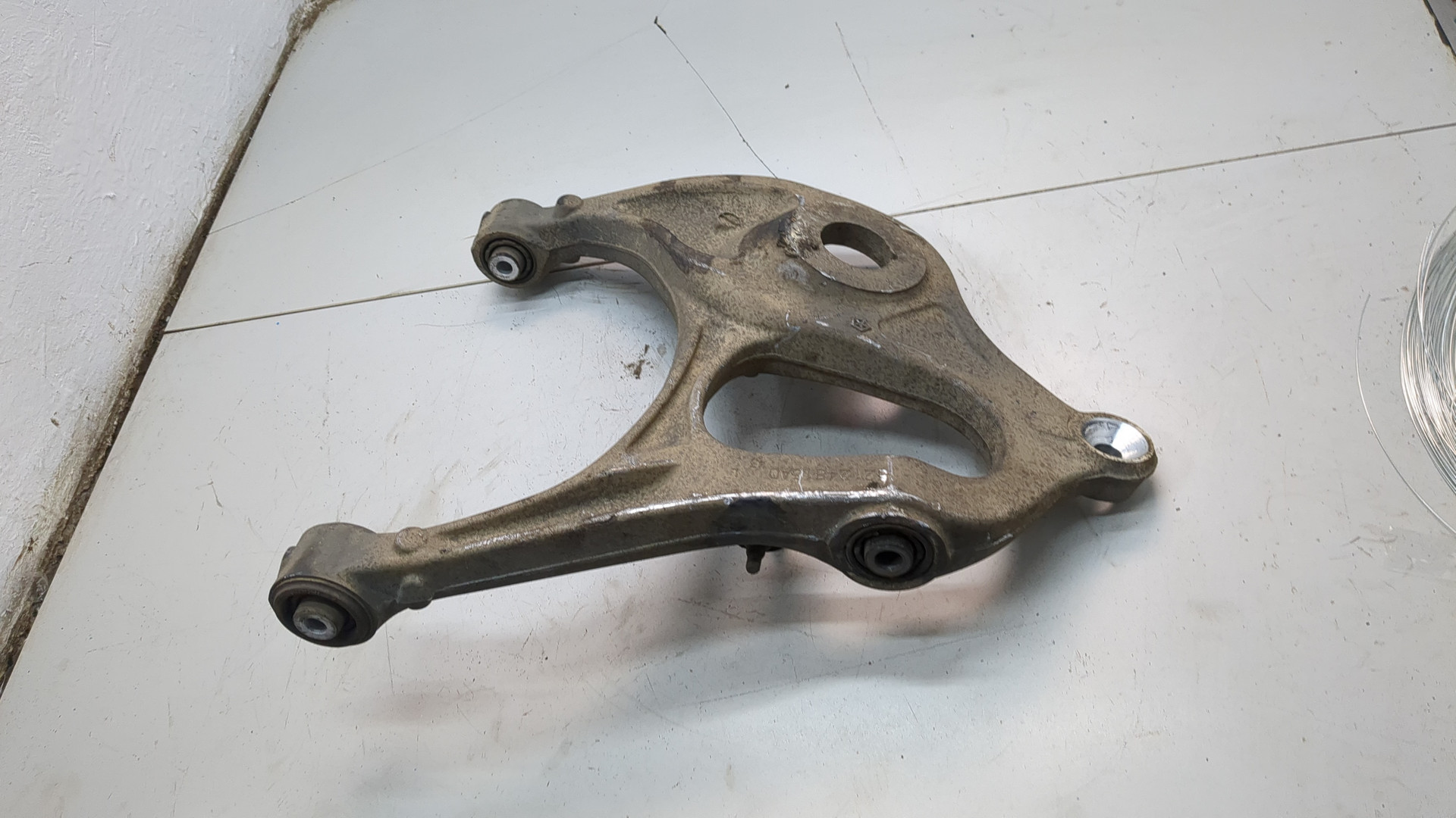 Рычаг задний левый