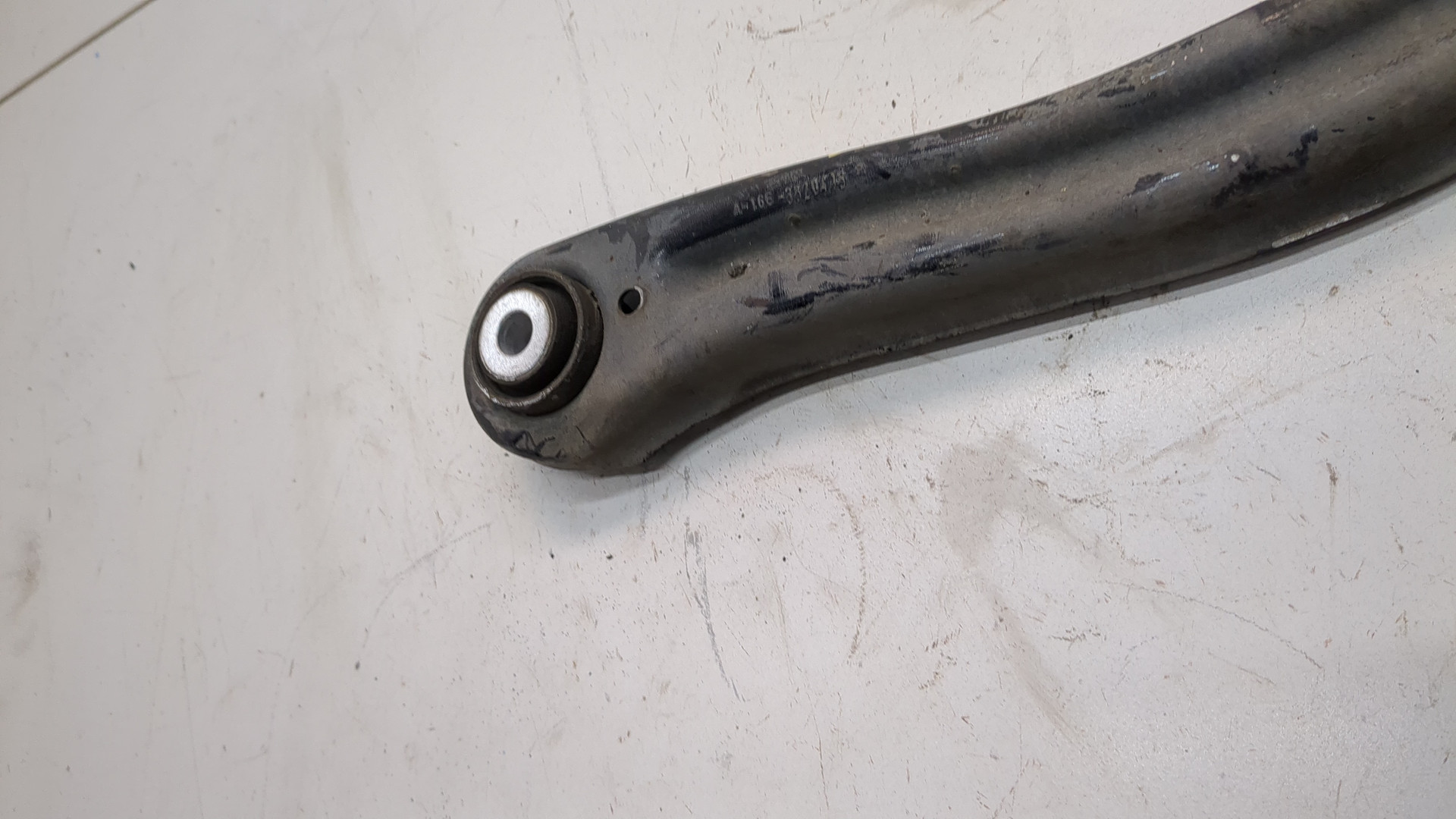 Рычаг задний