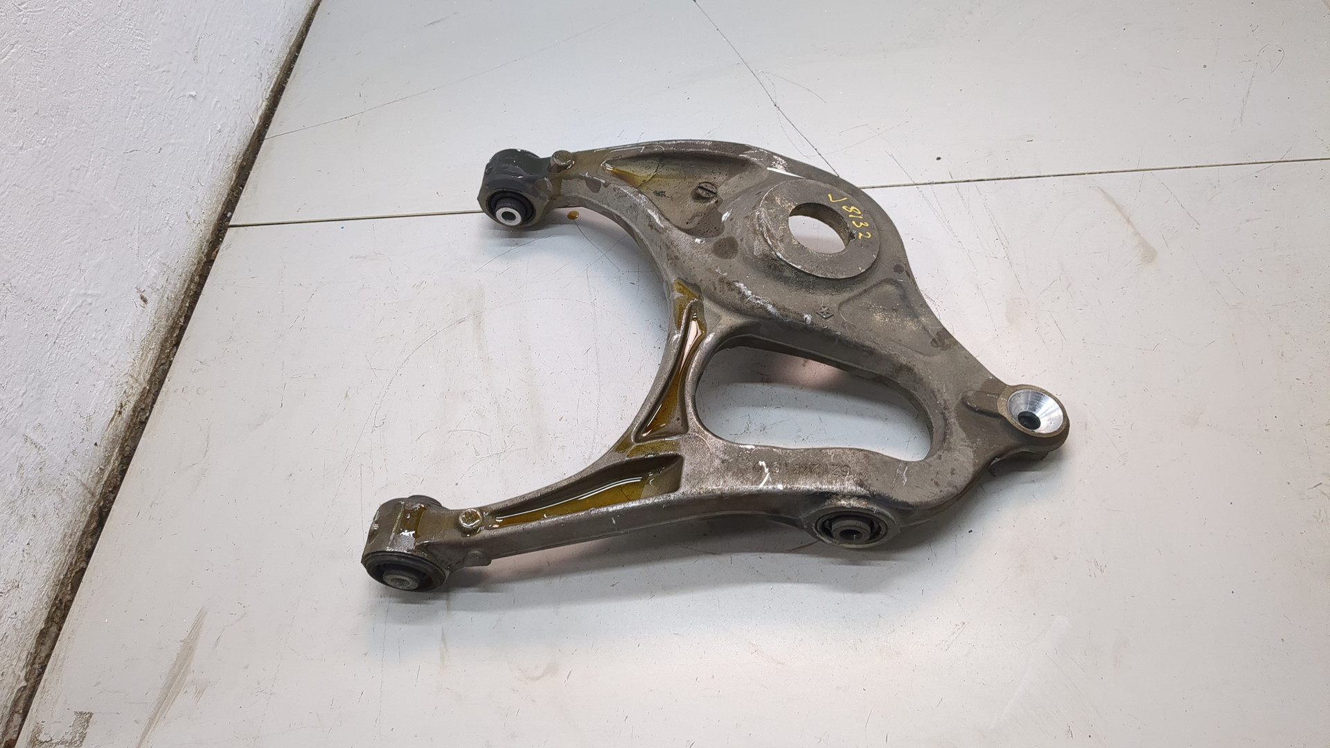 Рычаг задний левый