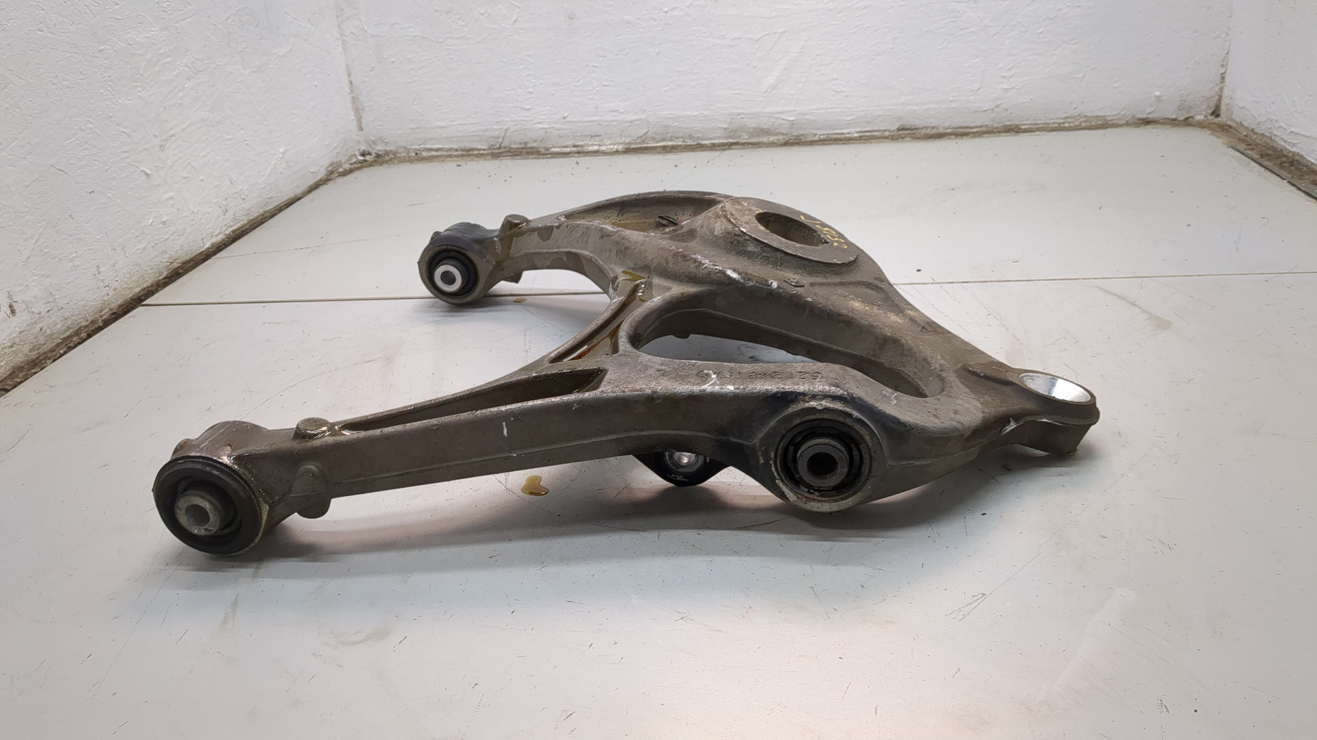 Рычаг задний левый