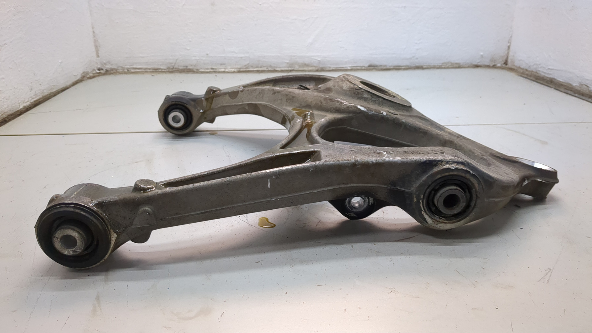 Рычаг задний левый