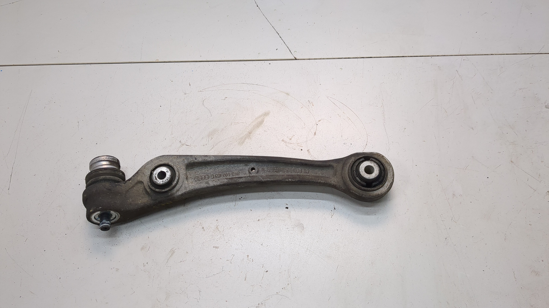 Рычаг передний левый