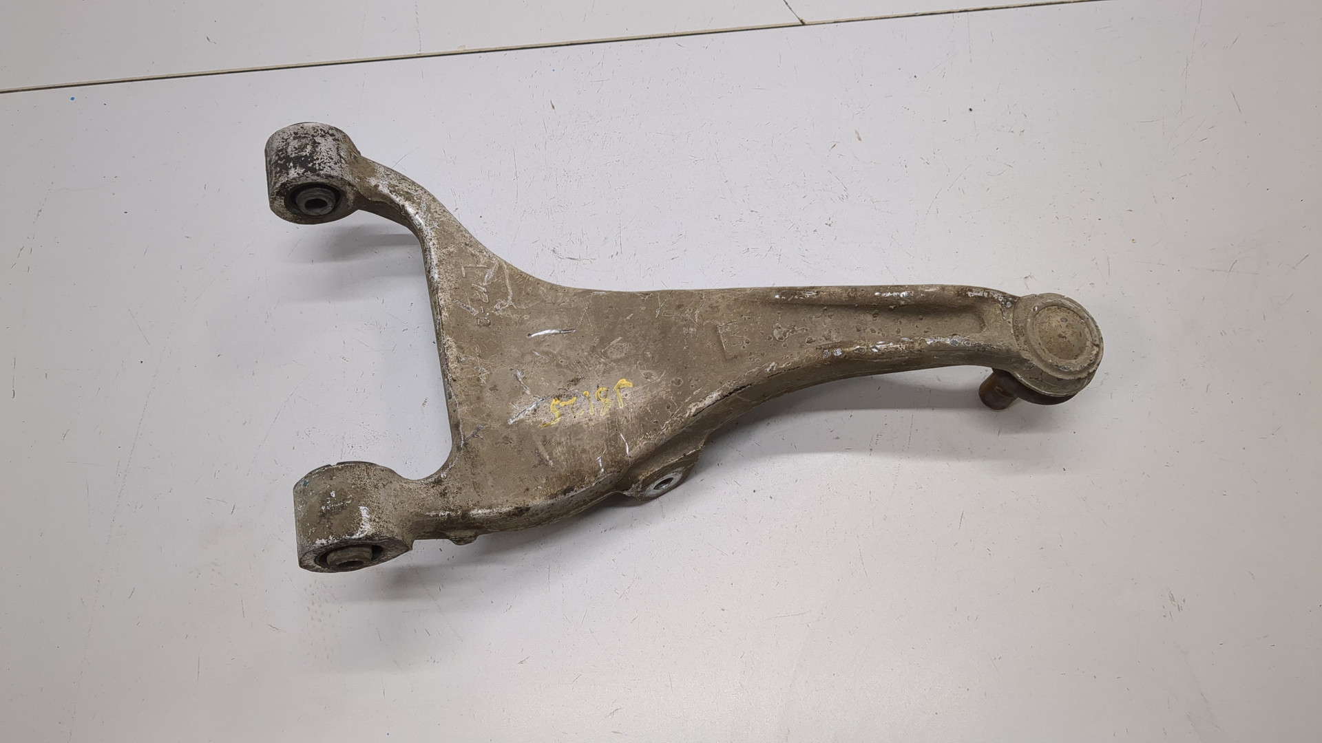 Рычаг задний левый