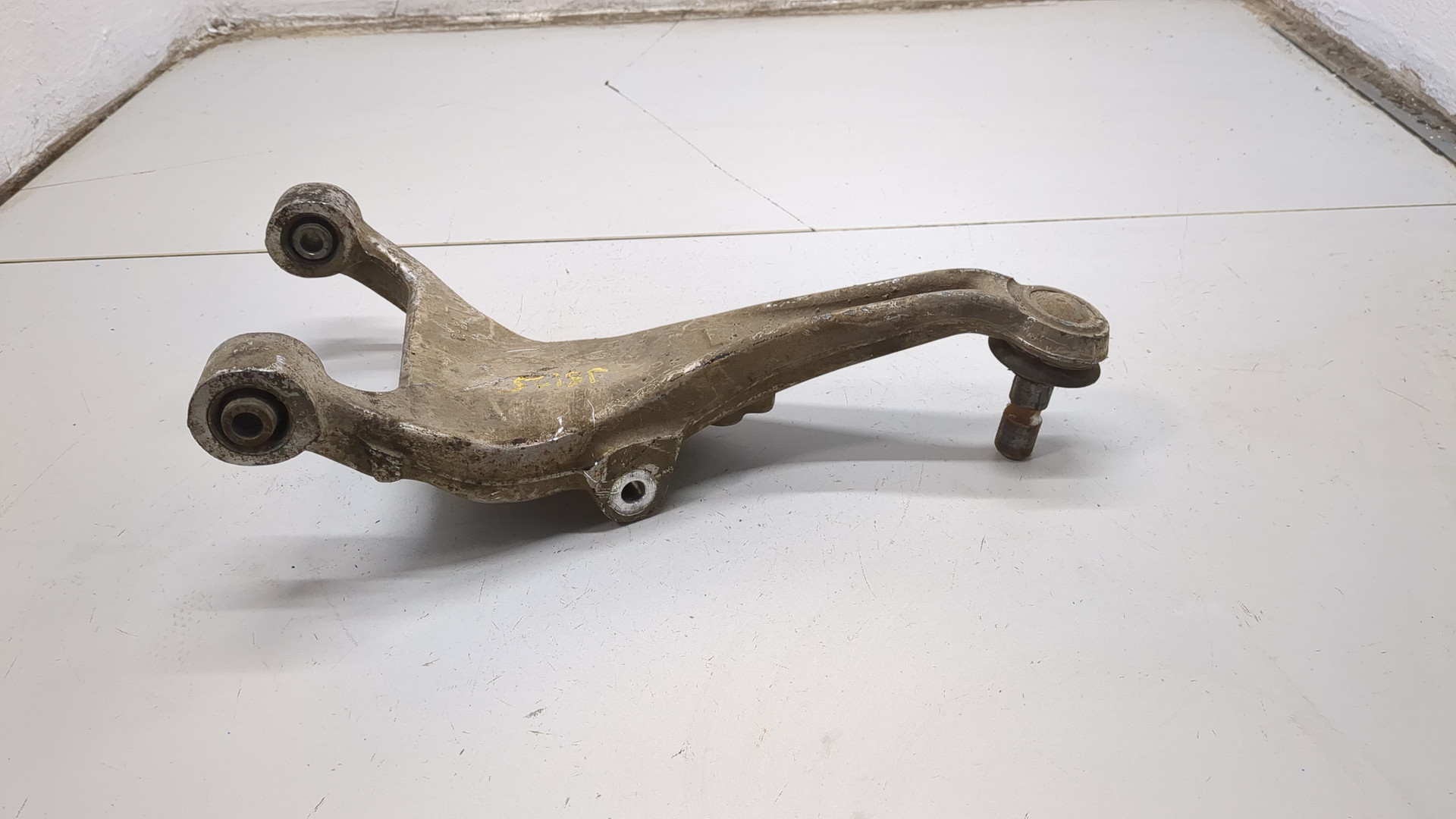 Рычаг задний левый