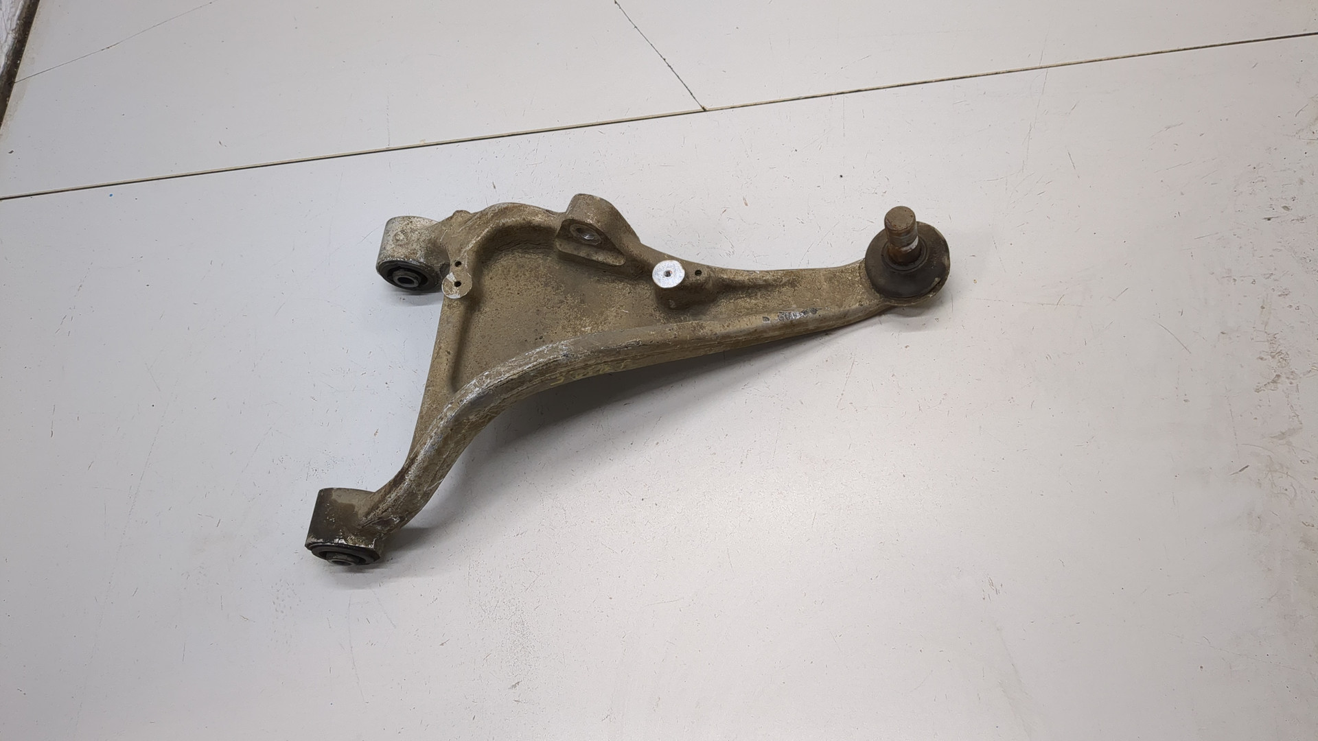 Рычаг задний левый