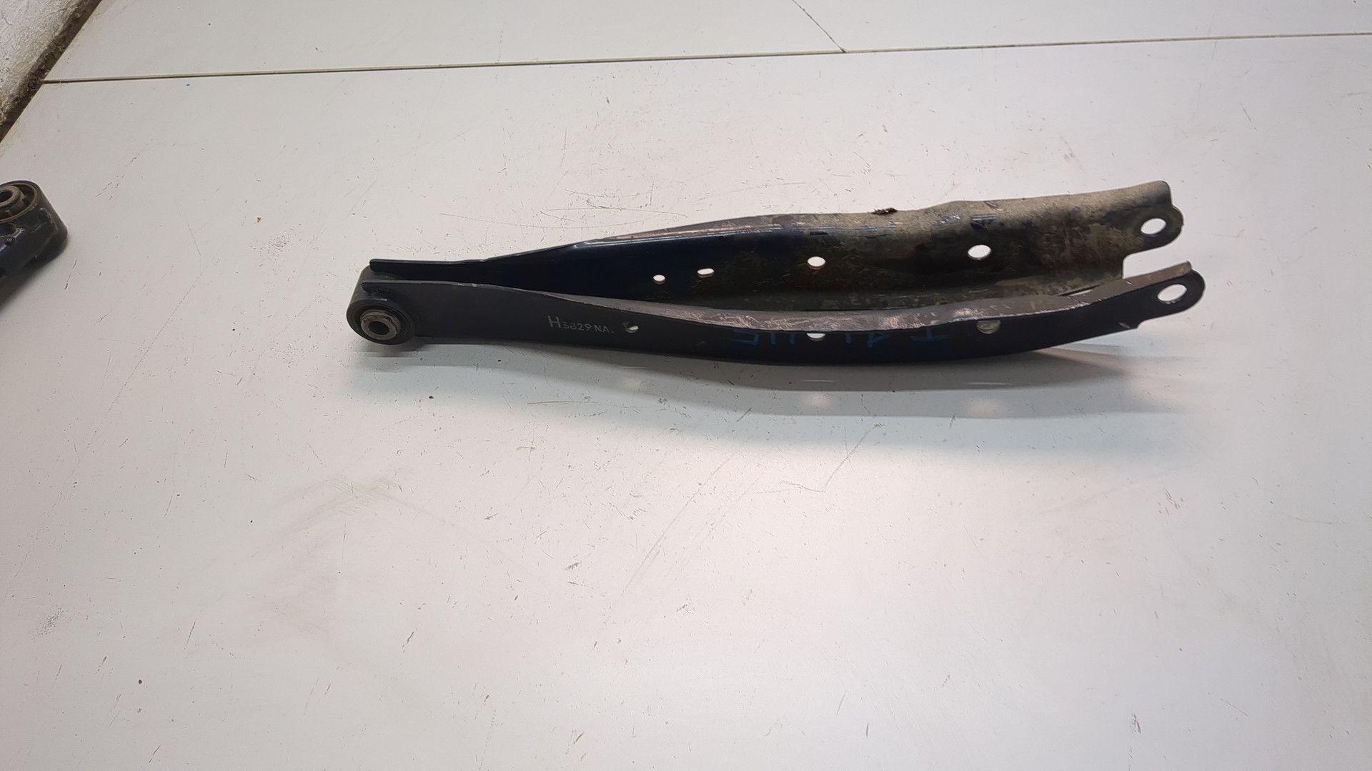 Рычаг задний