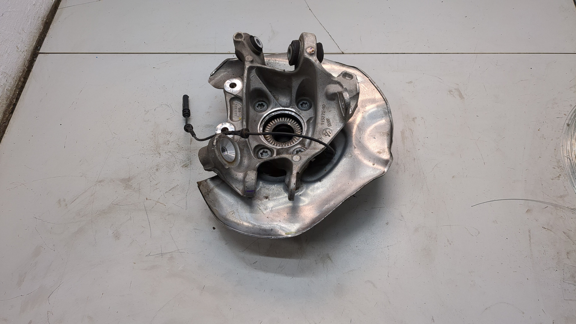 Кулак поворотный задний левый