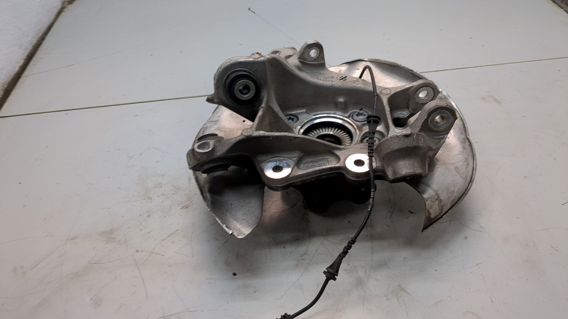 Кулак поворотный задний левый