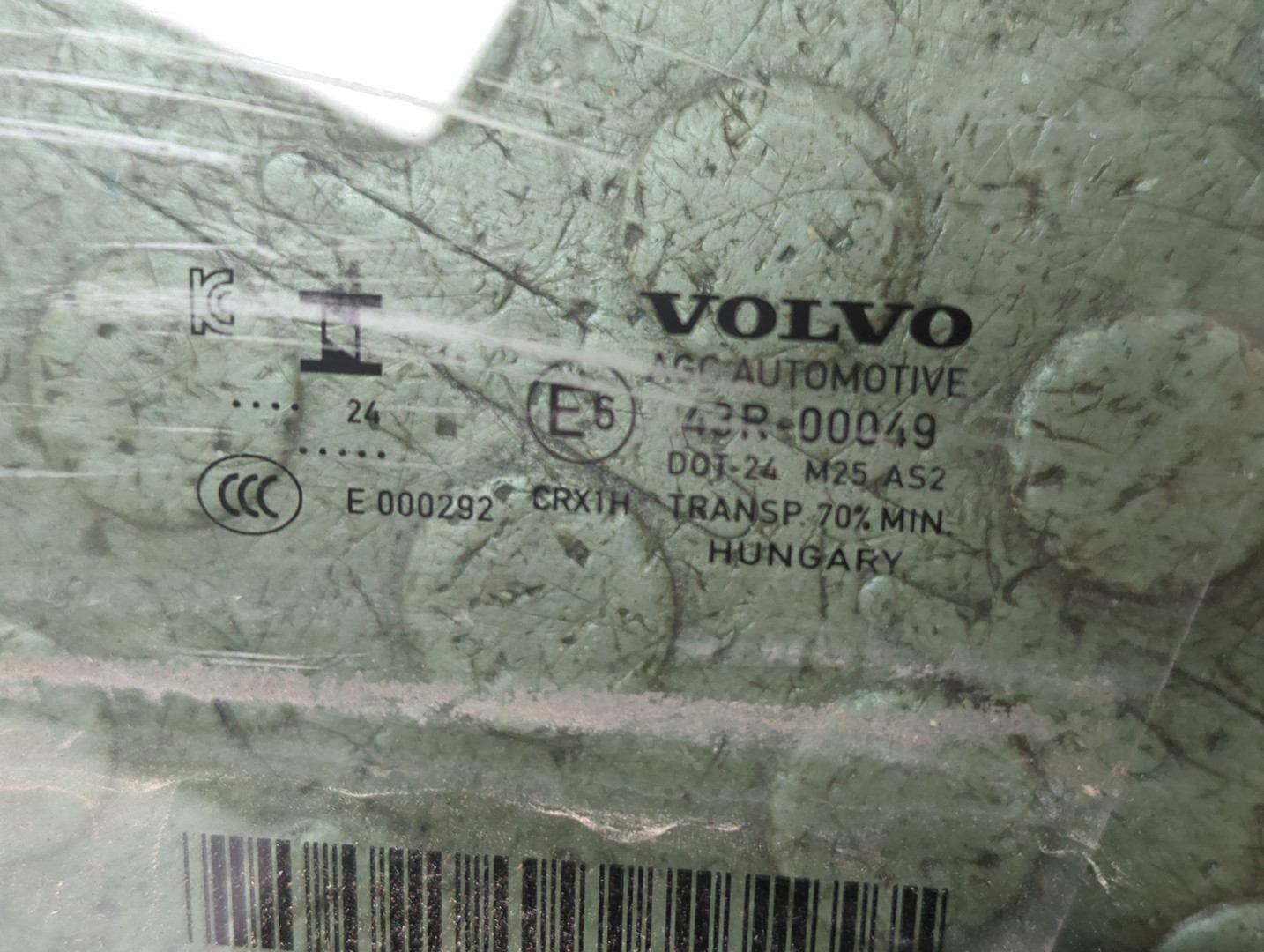 Стекло двери передней левой