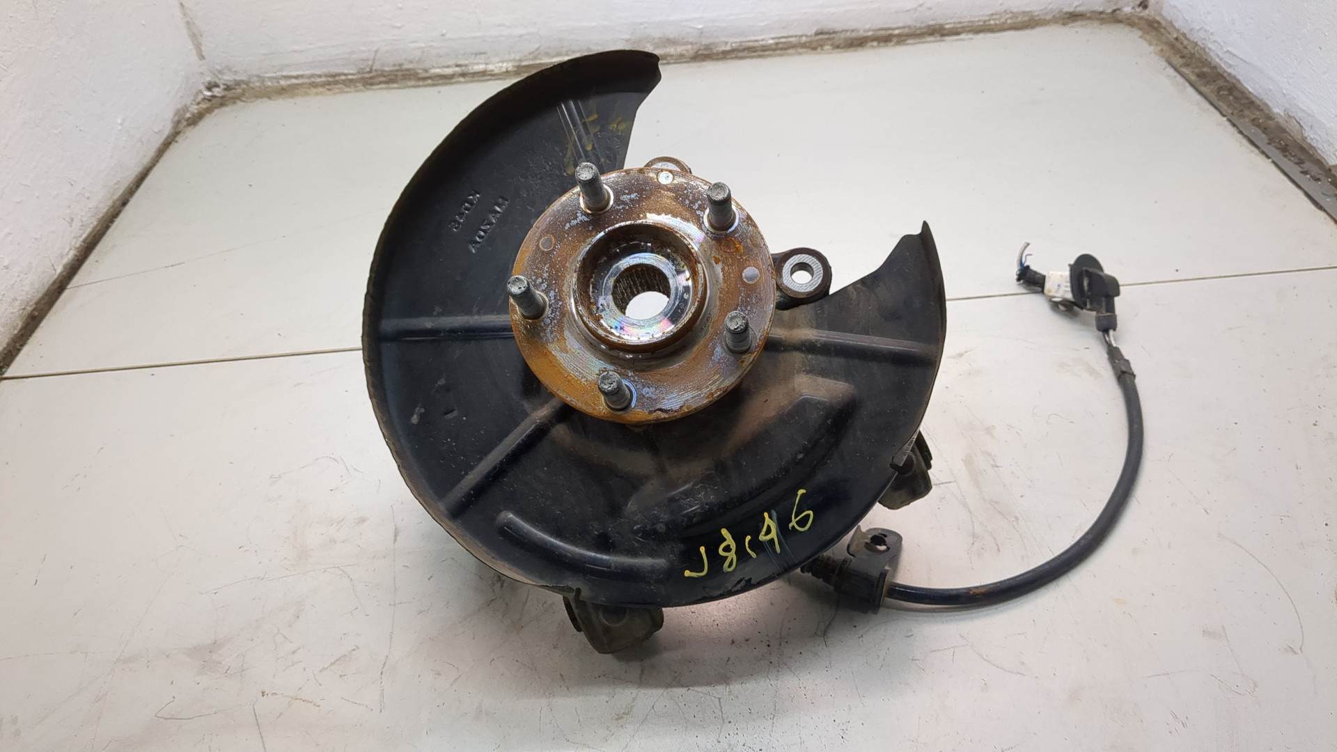 Кулак поворотный задний левый