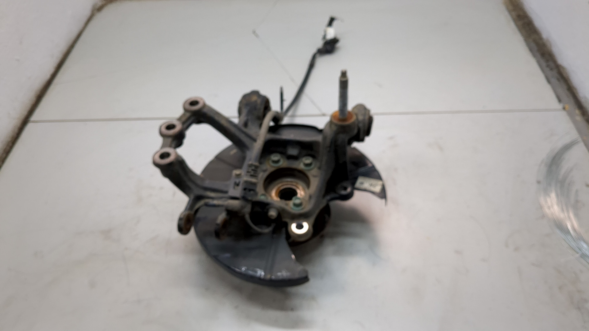 Кулак поворотный задний левый