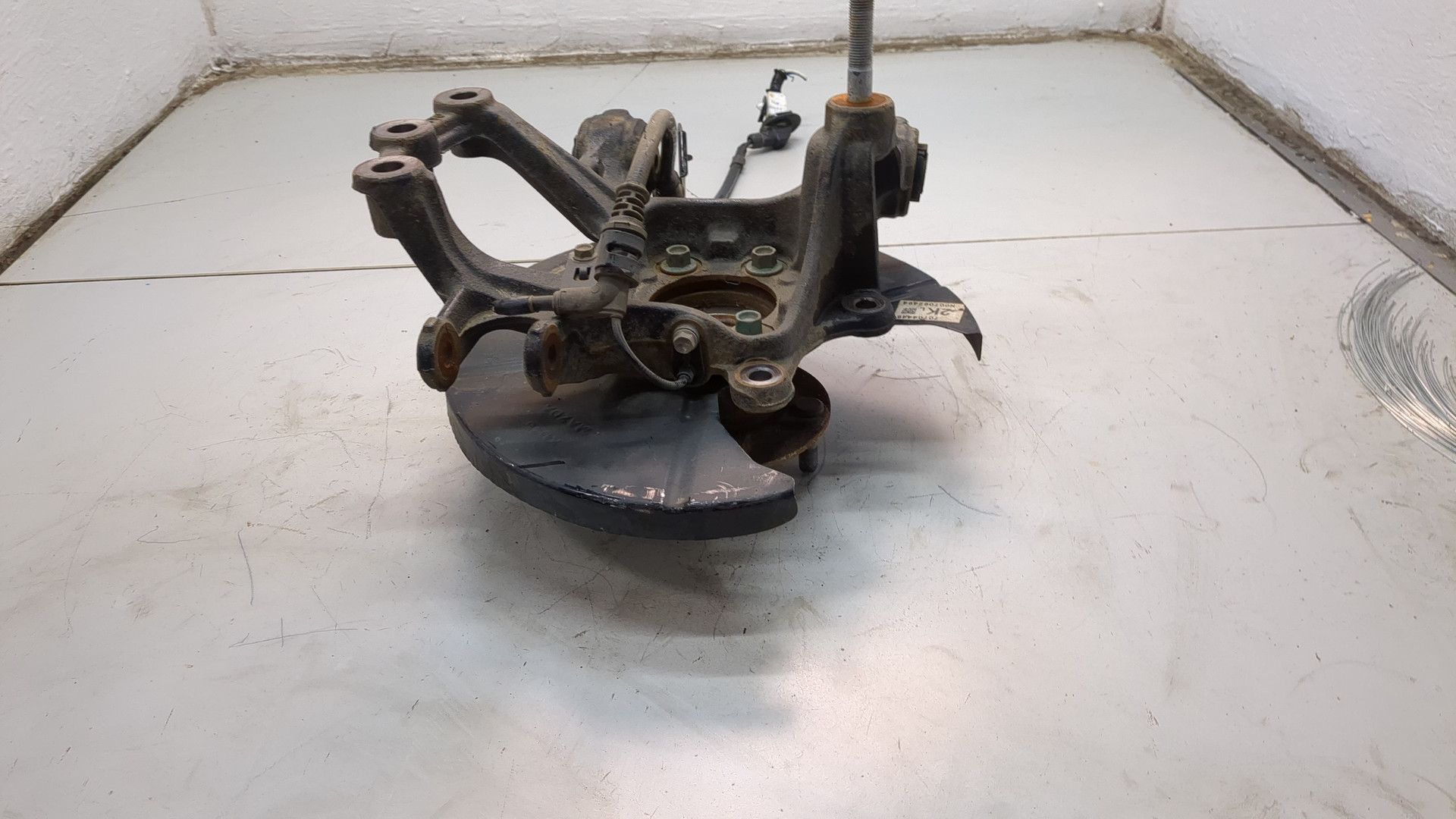 Кулак поворотный задний левый