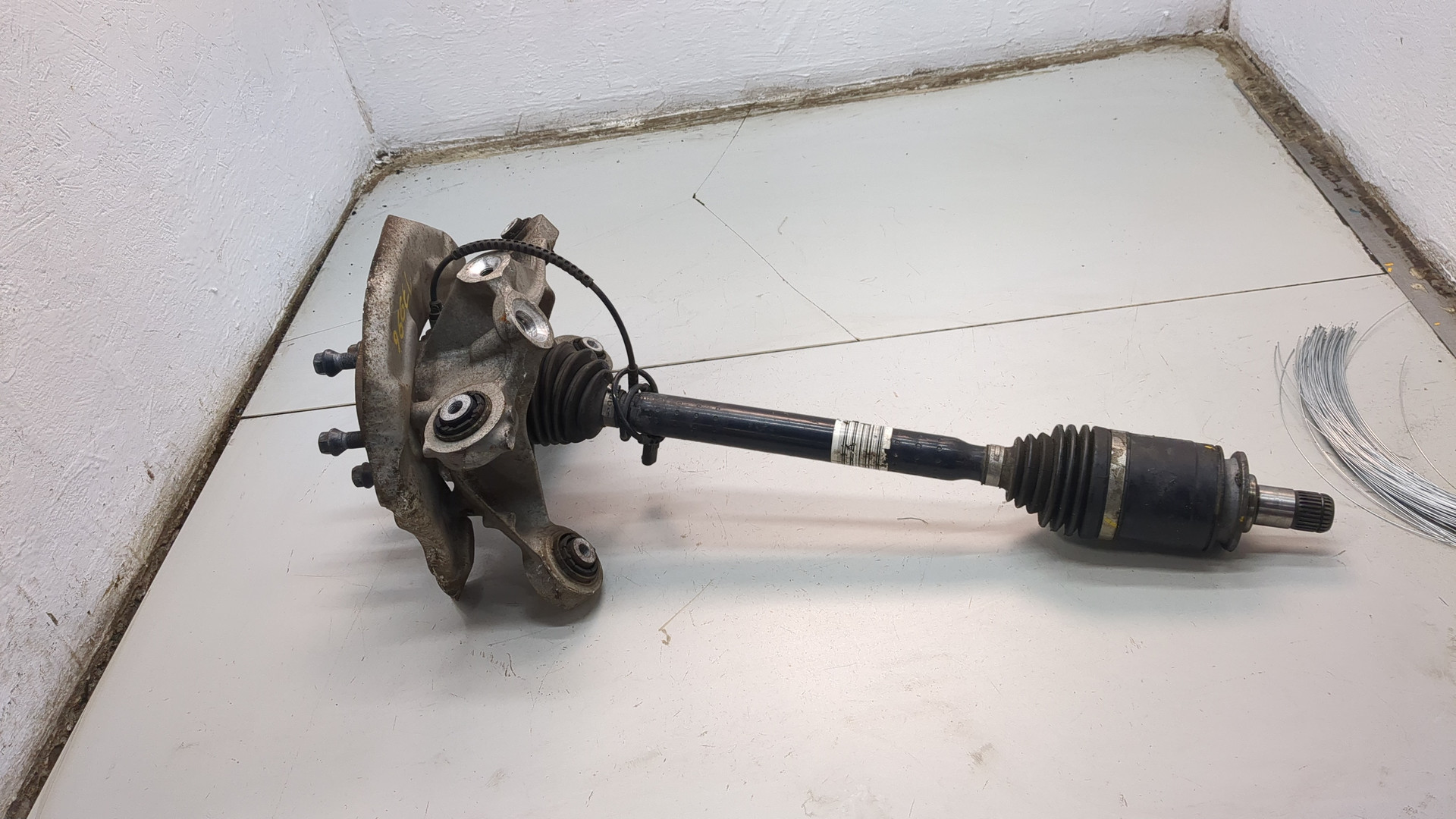 Кулак поворотный задний левый