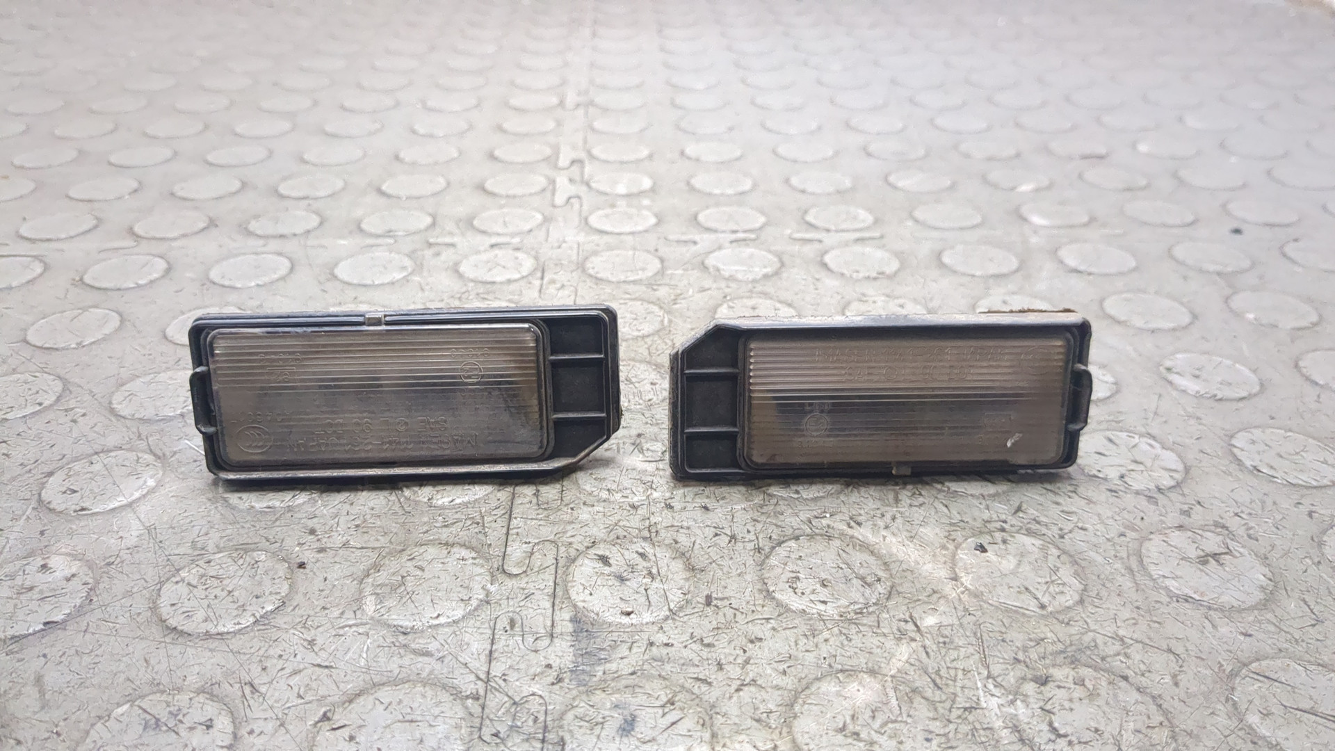 Фонарь подсветки номера