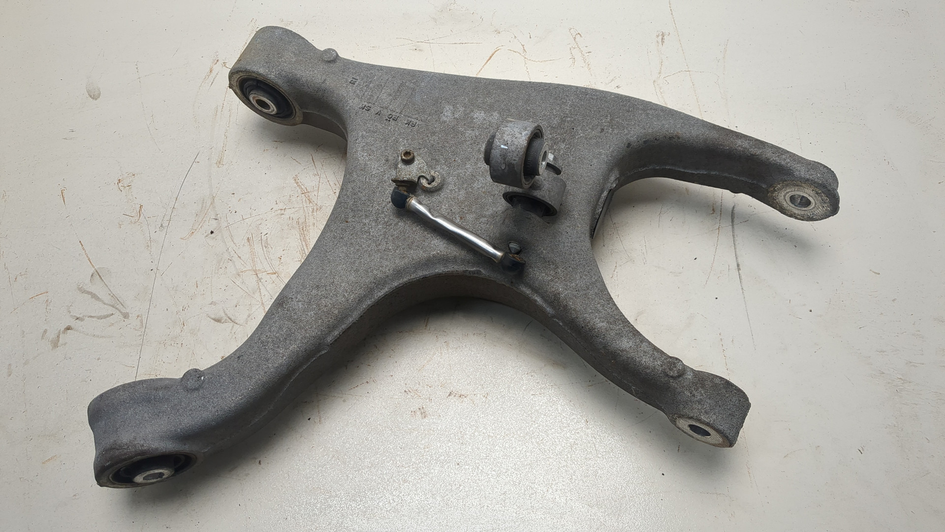 Рычаг задний левый