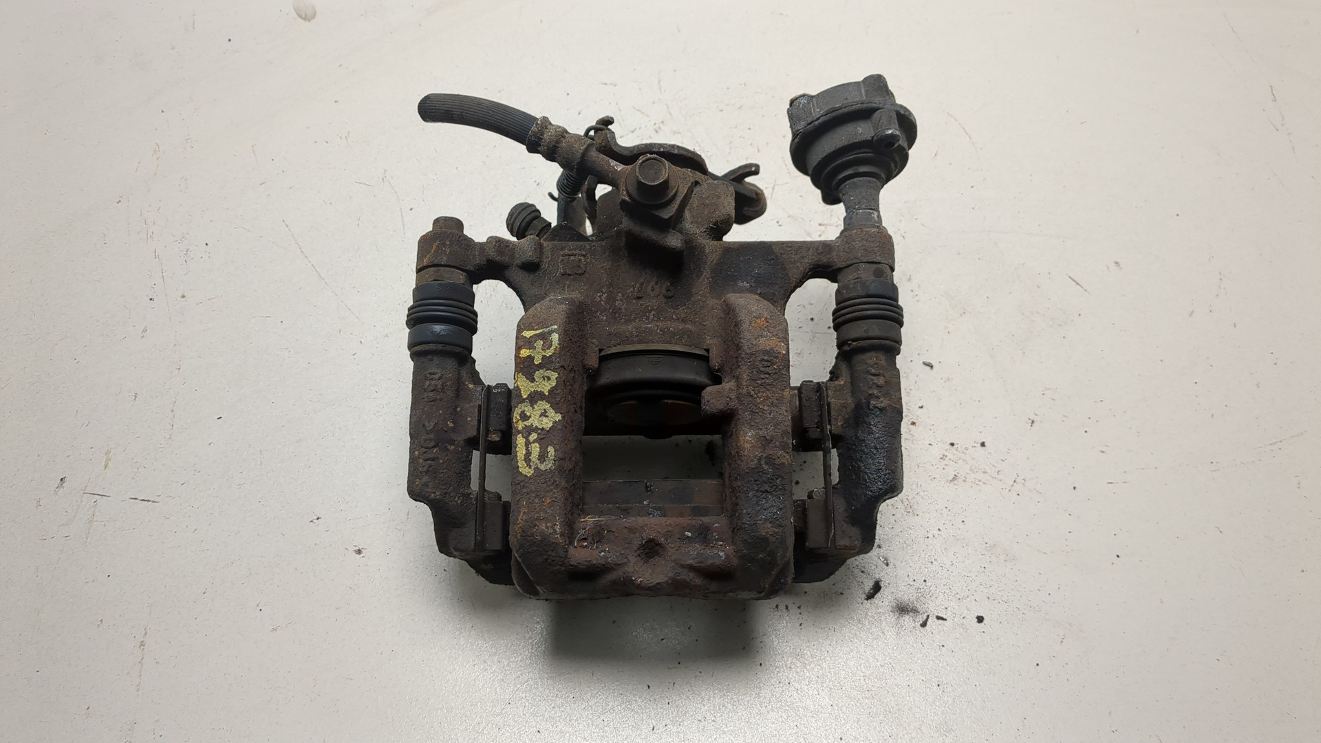 Суппорт задний левый