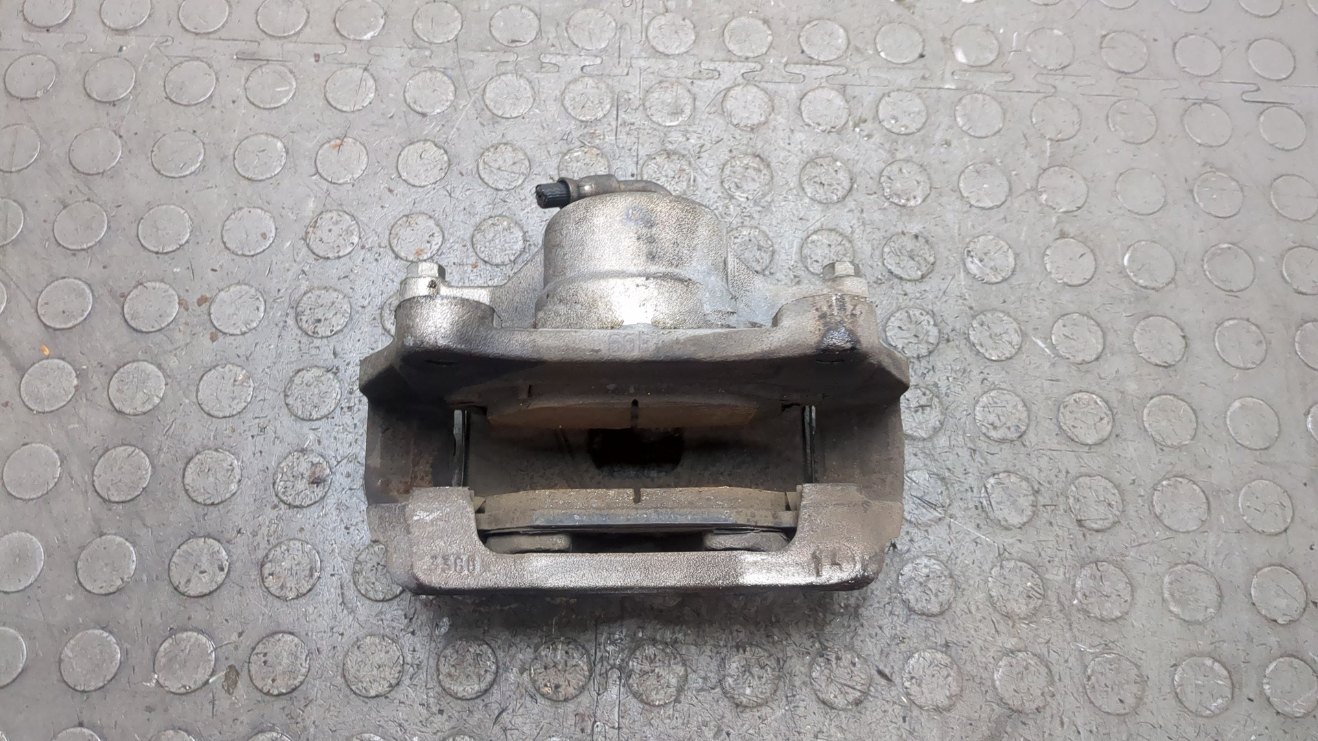 Суппорт передний левый