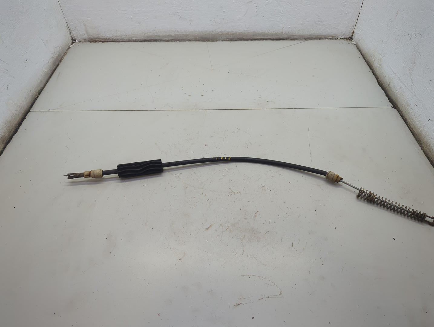 Трос стояночного тормоза