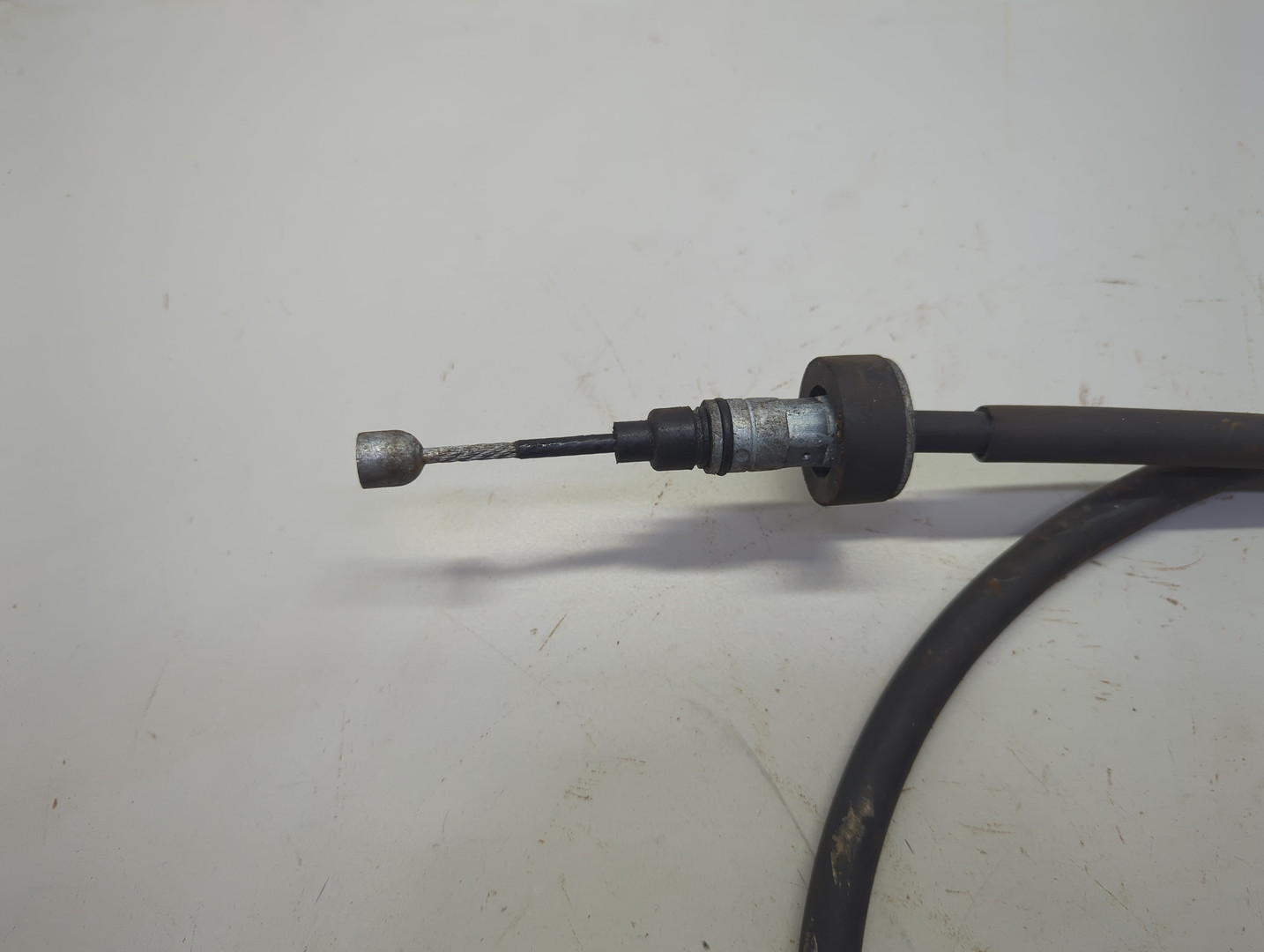 Трос стояночного тормоза