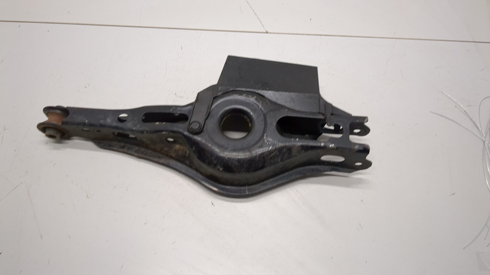 Рычаг задний