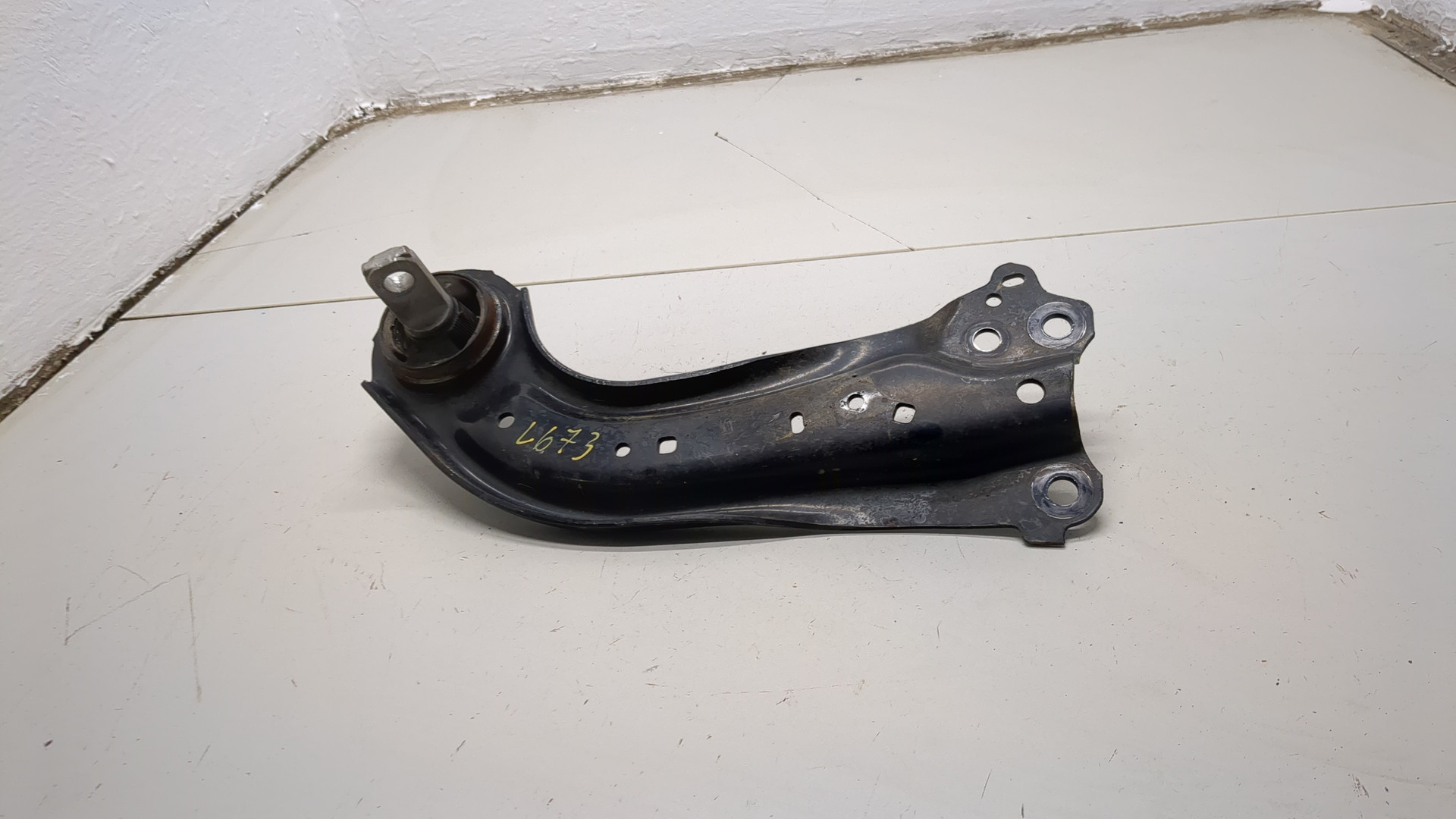 Рычаг задний левый