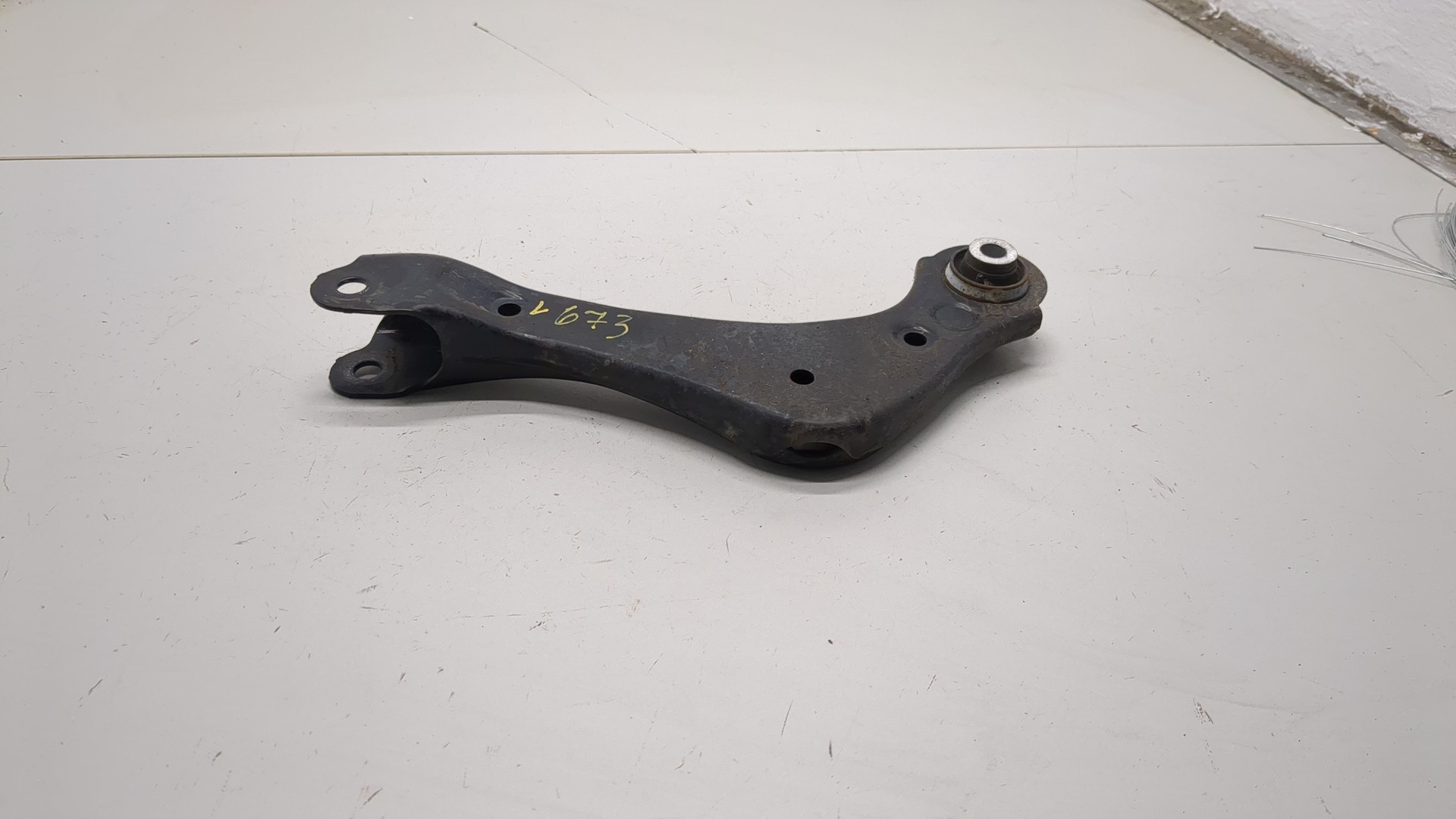 Рычаг задний левый