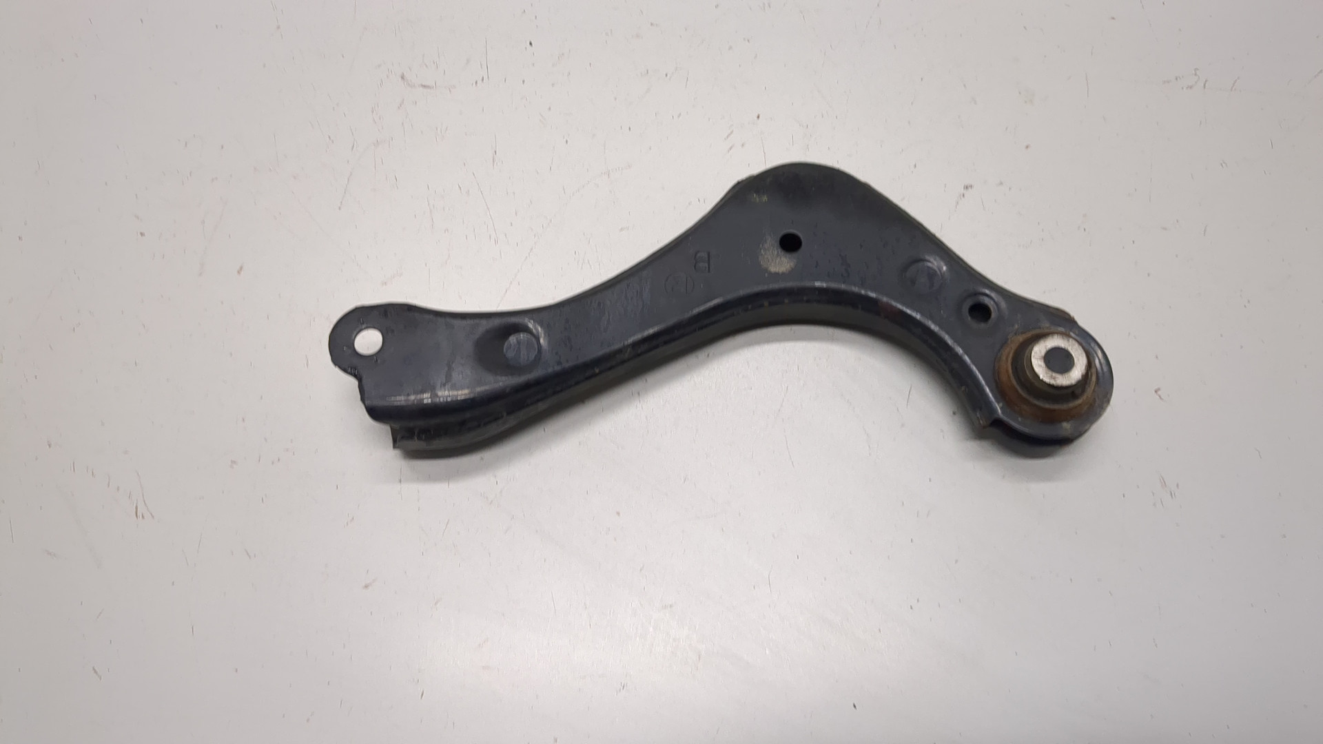 Рычаг задний левый