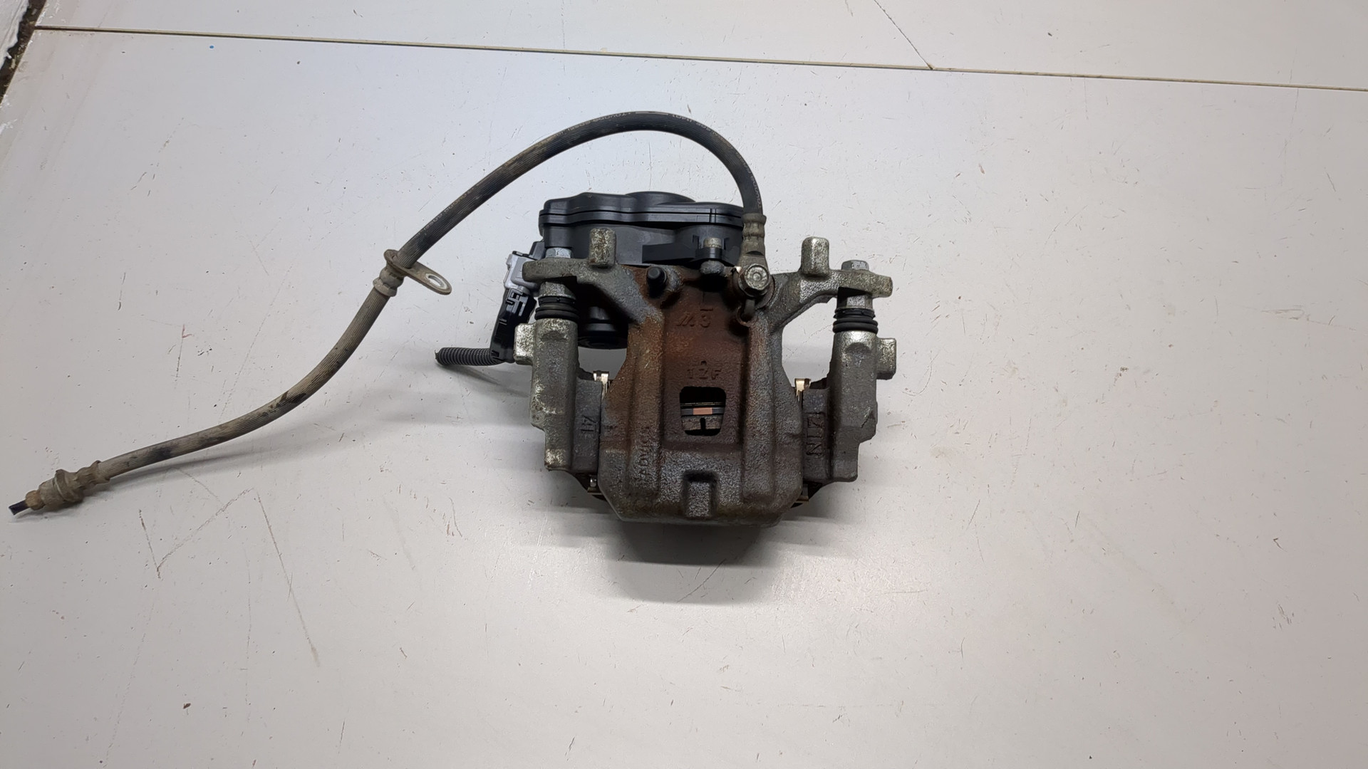 Суппорт задний левый