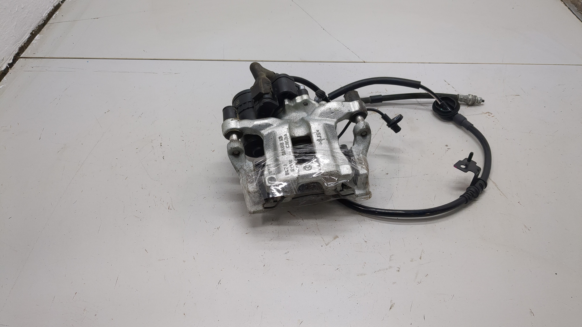 Суппорт задний левый