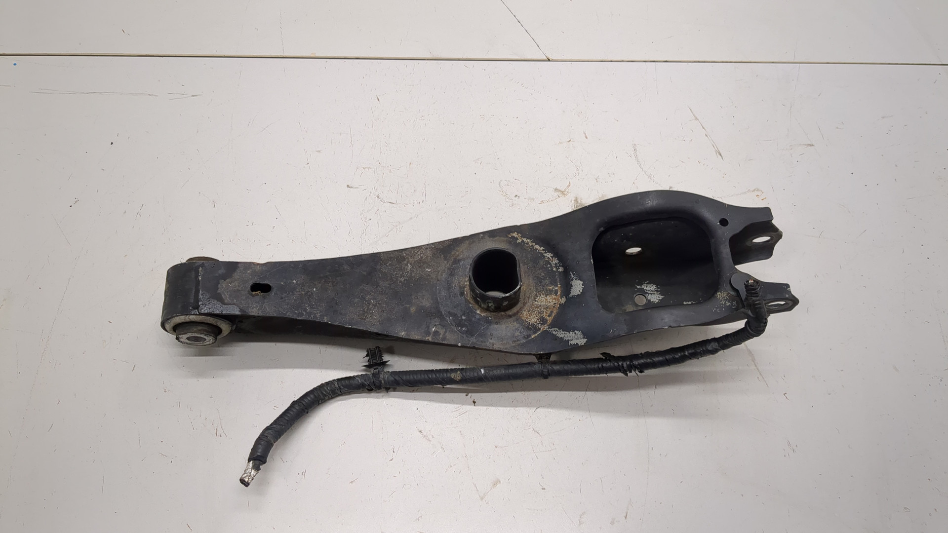 Рычаг задний