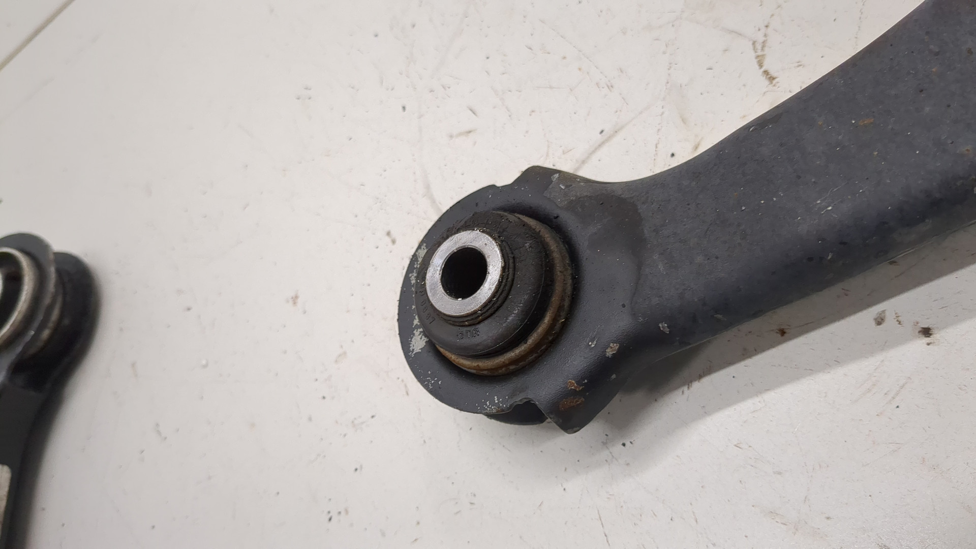 Рычаг задний