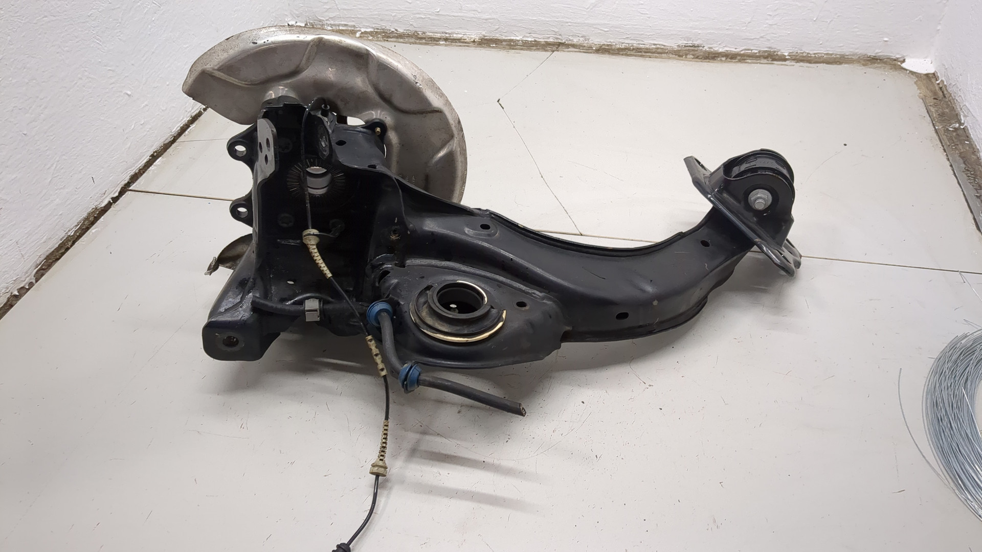 Кулак поворотный задний левый