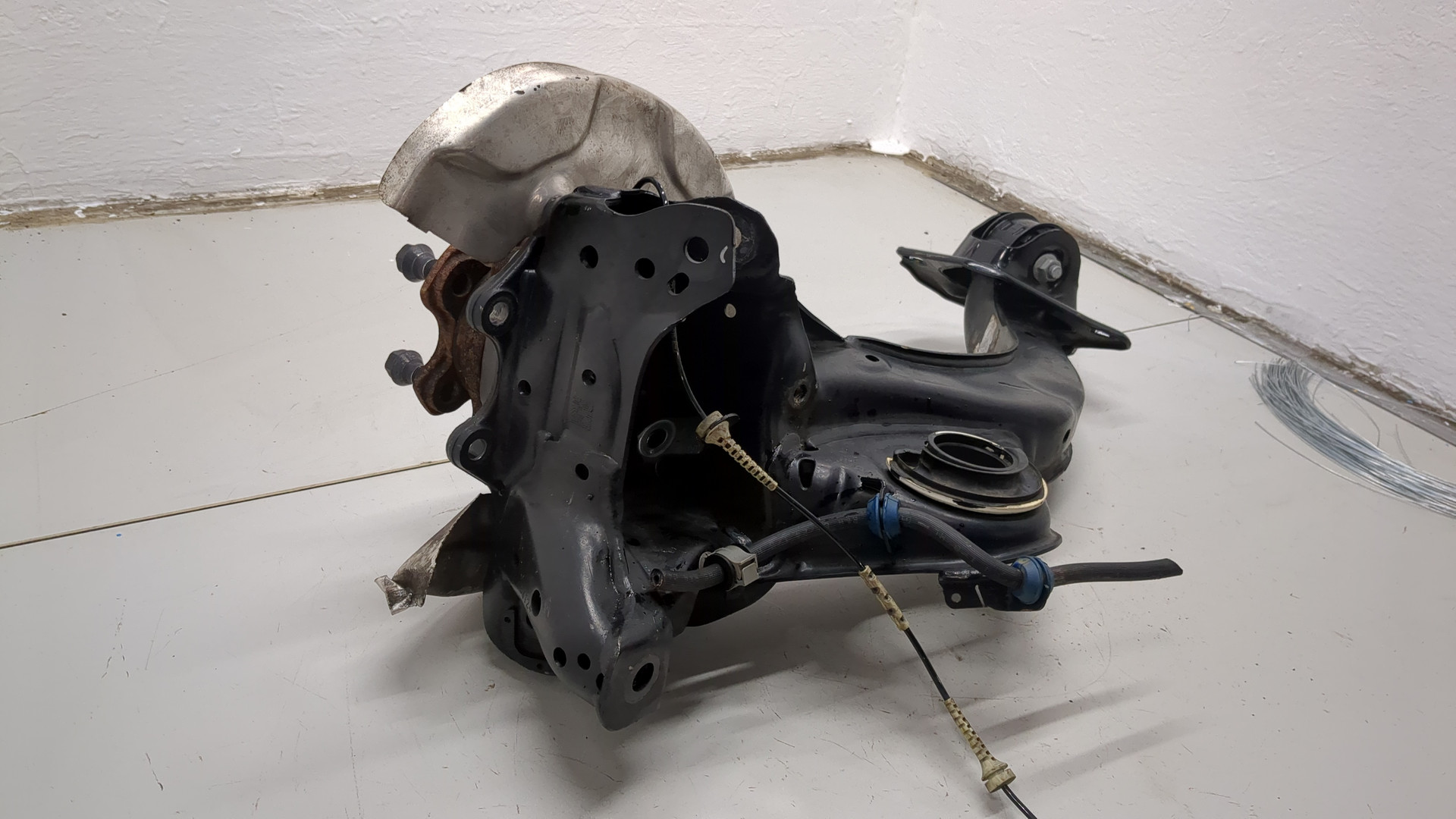 Кулак поворотный задний левый